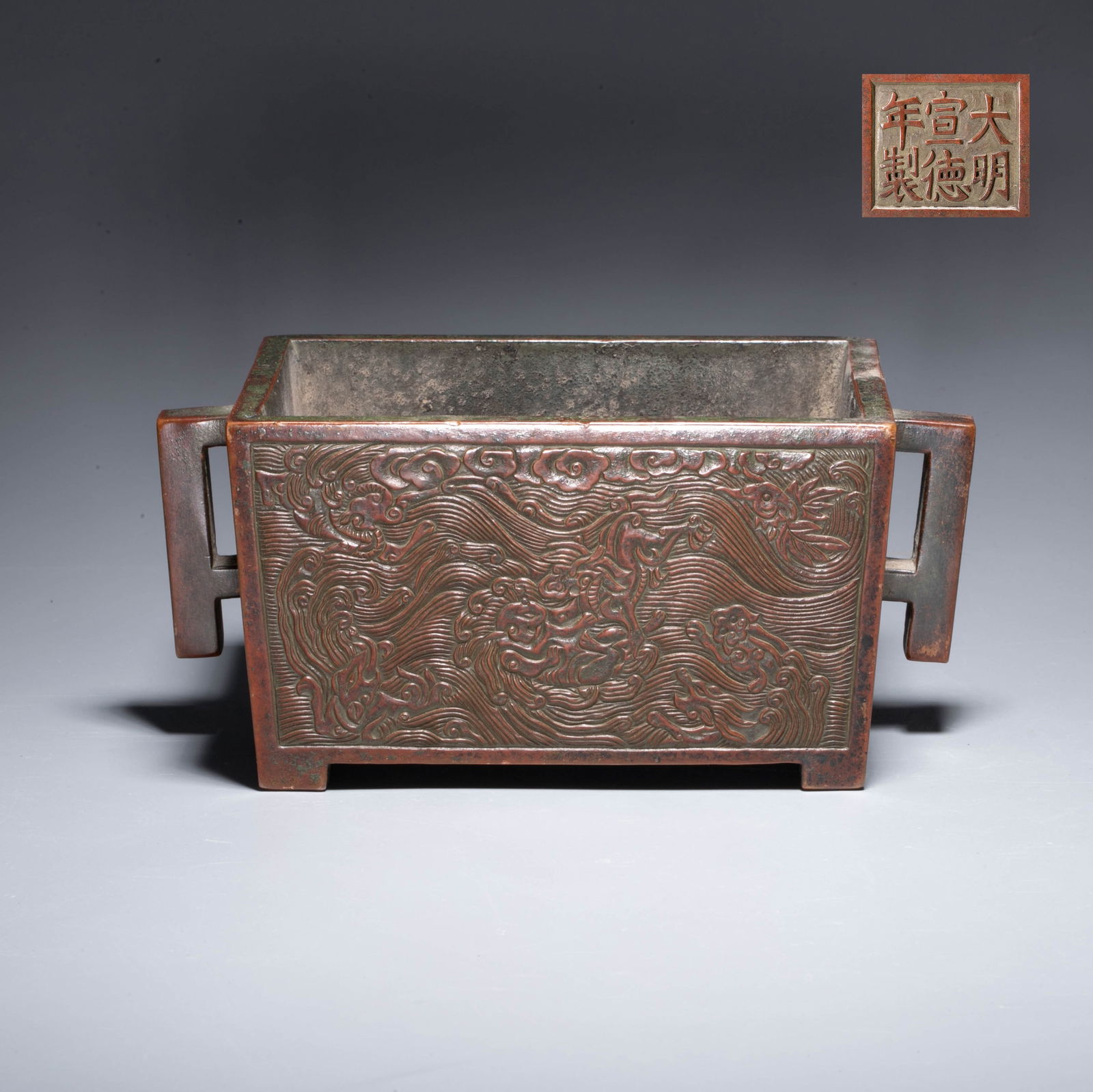 Ming dynasty bronze manger stove with sea animal pattern: Ming dynasty bronze manger stove with sea animal pattern