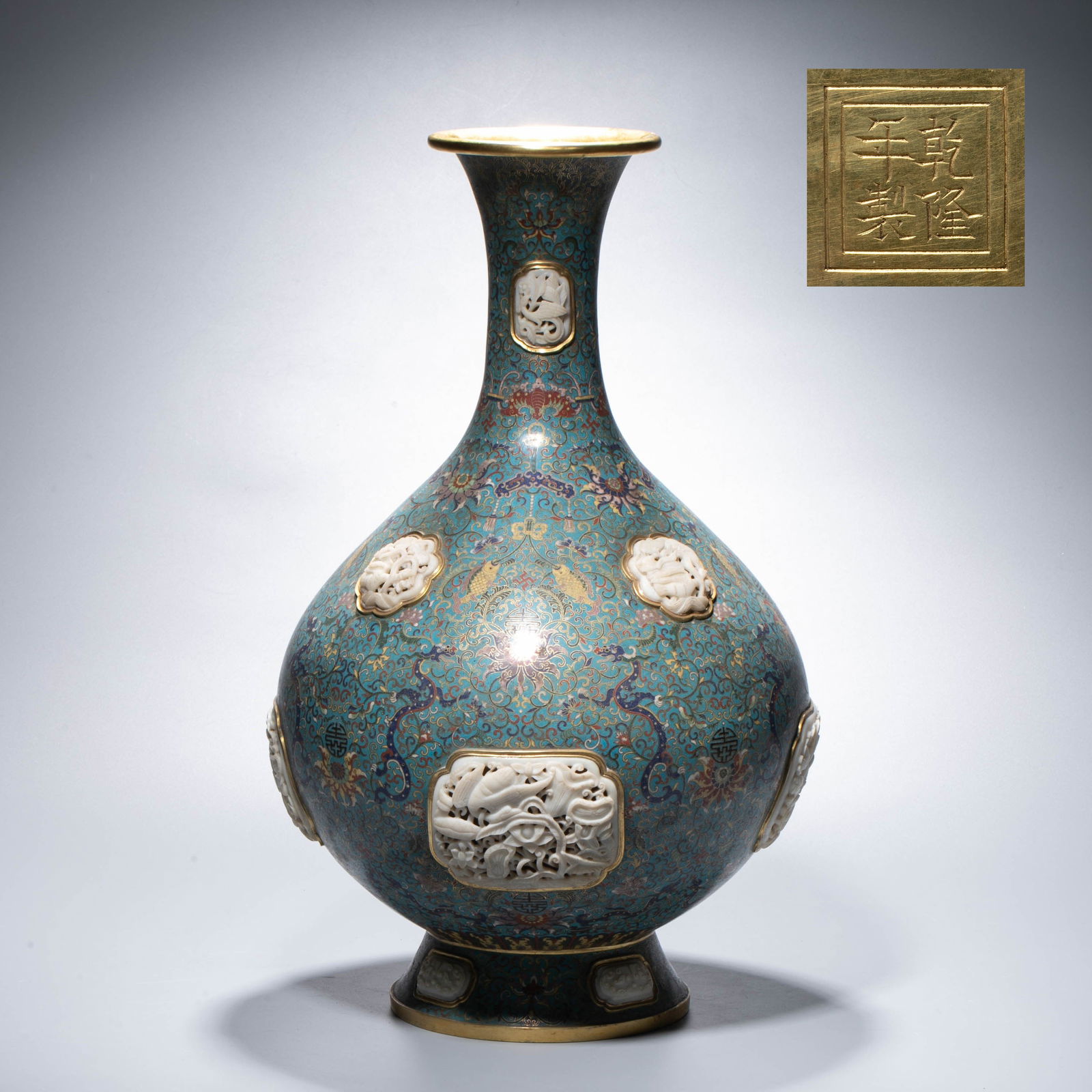 Cloisonné Enamel Yuhuchun Vase, Qing Dynasty: This Vase is a fine piece of cloisonné (copper-embedded filigree enamel) from the Qing Dynasty. it is shaped like a jade pot in the spring style, with a narrow neck, a hanging belly and rounded