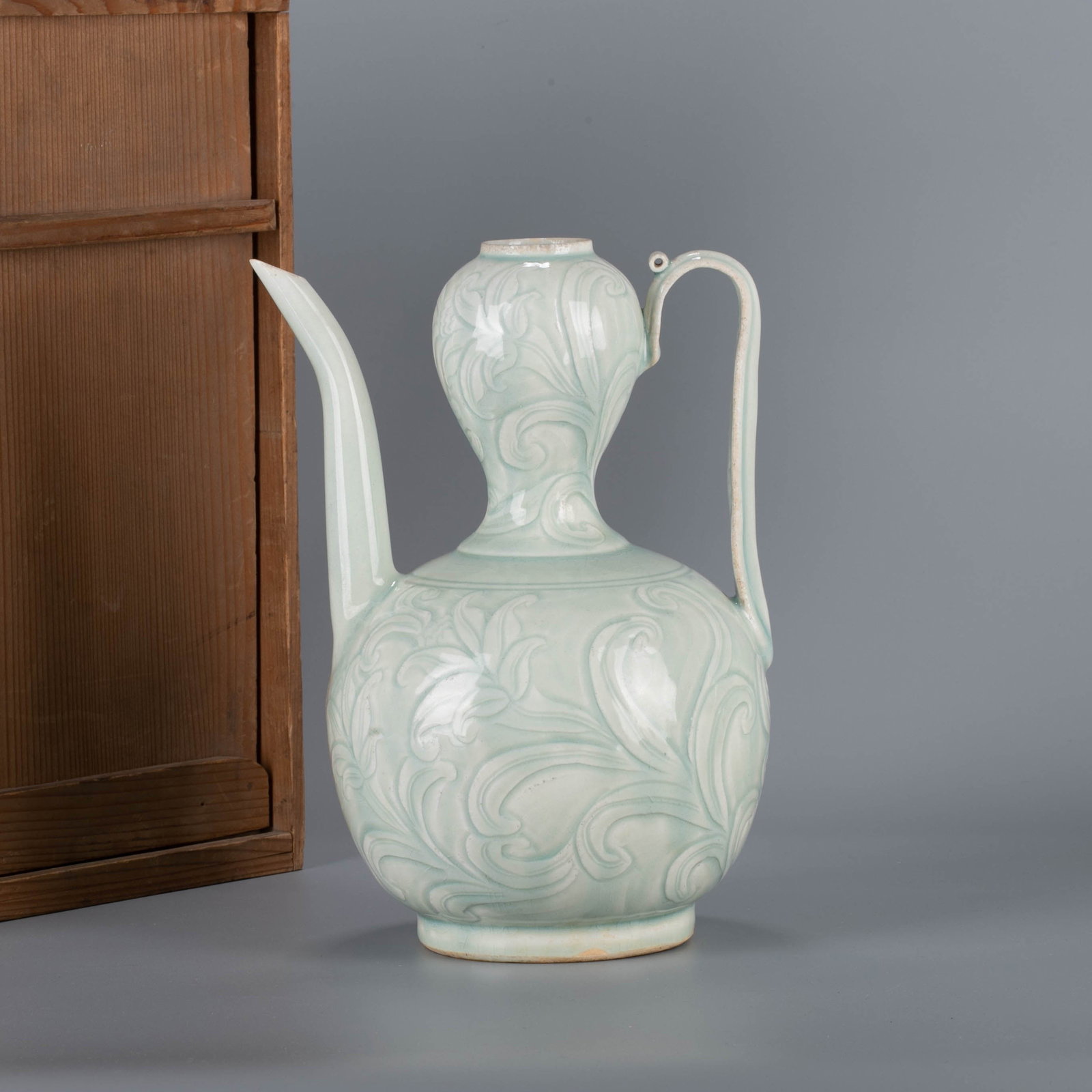 Song Dynasty Hutian kiln shadow green incised flower-held ewer in a box (1 of 7)