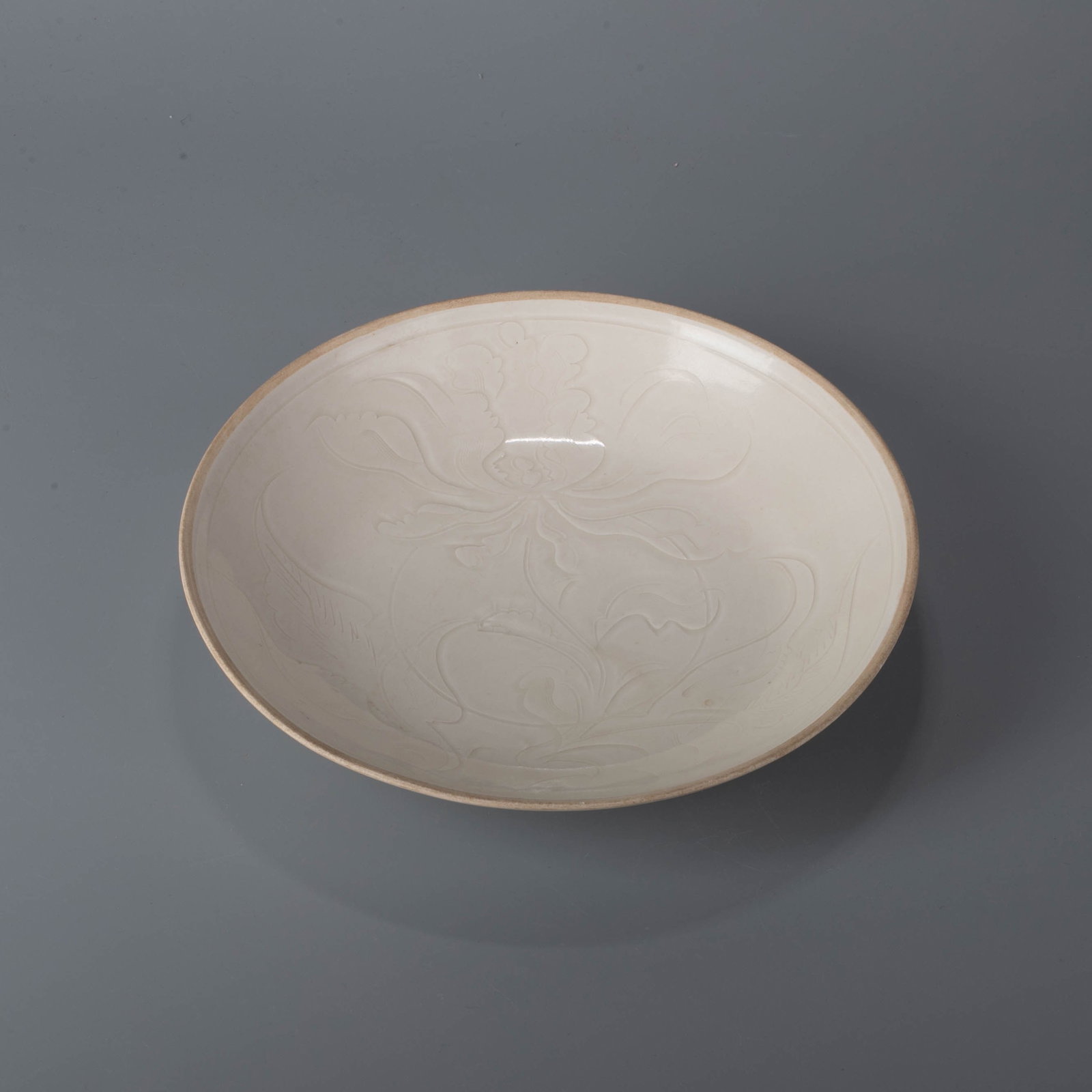 Ding kiln incised flower plate: Ding kiln incised flower plate