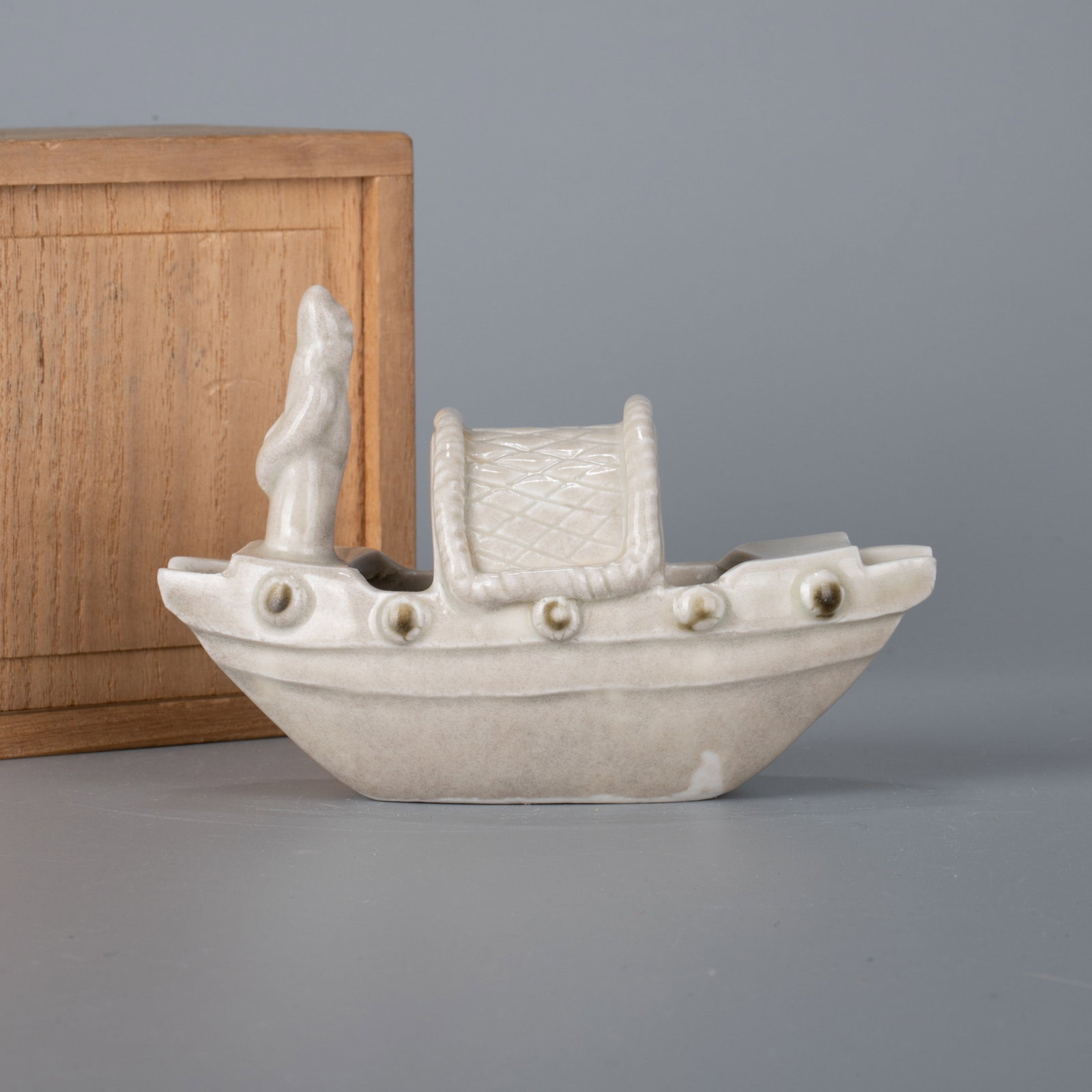 Song Dynasty Ding kiln boat-shaped storage object (1 of 8)