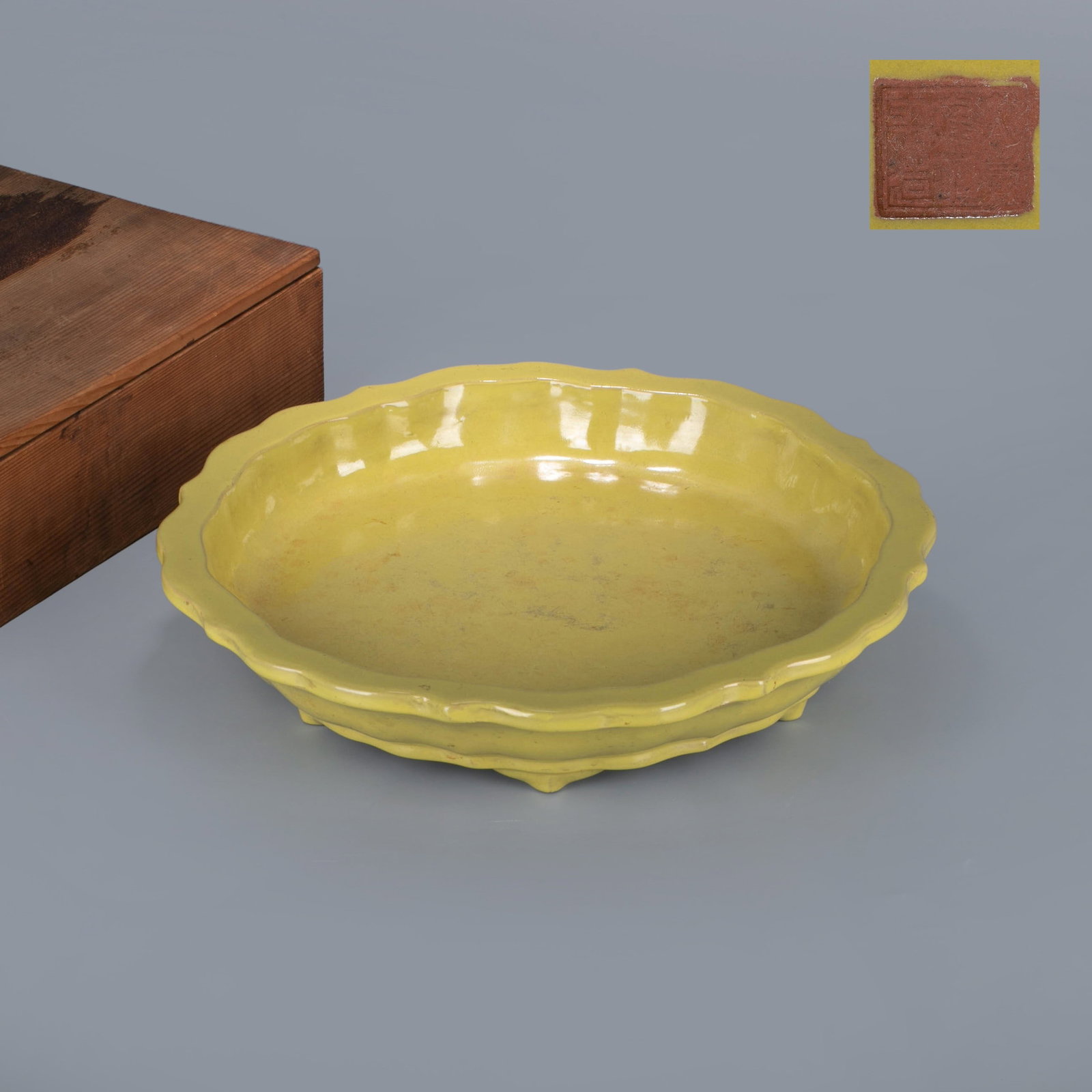 A red clay yellow glaze water basin made during the Yongzheng period of the Qing Dynasty: A red clay yellow glaze water basin made during the Yongzheng period of the Qing Dynasty