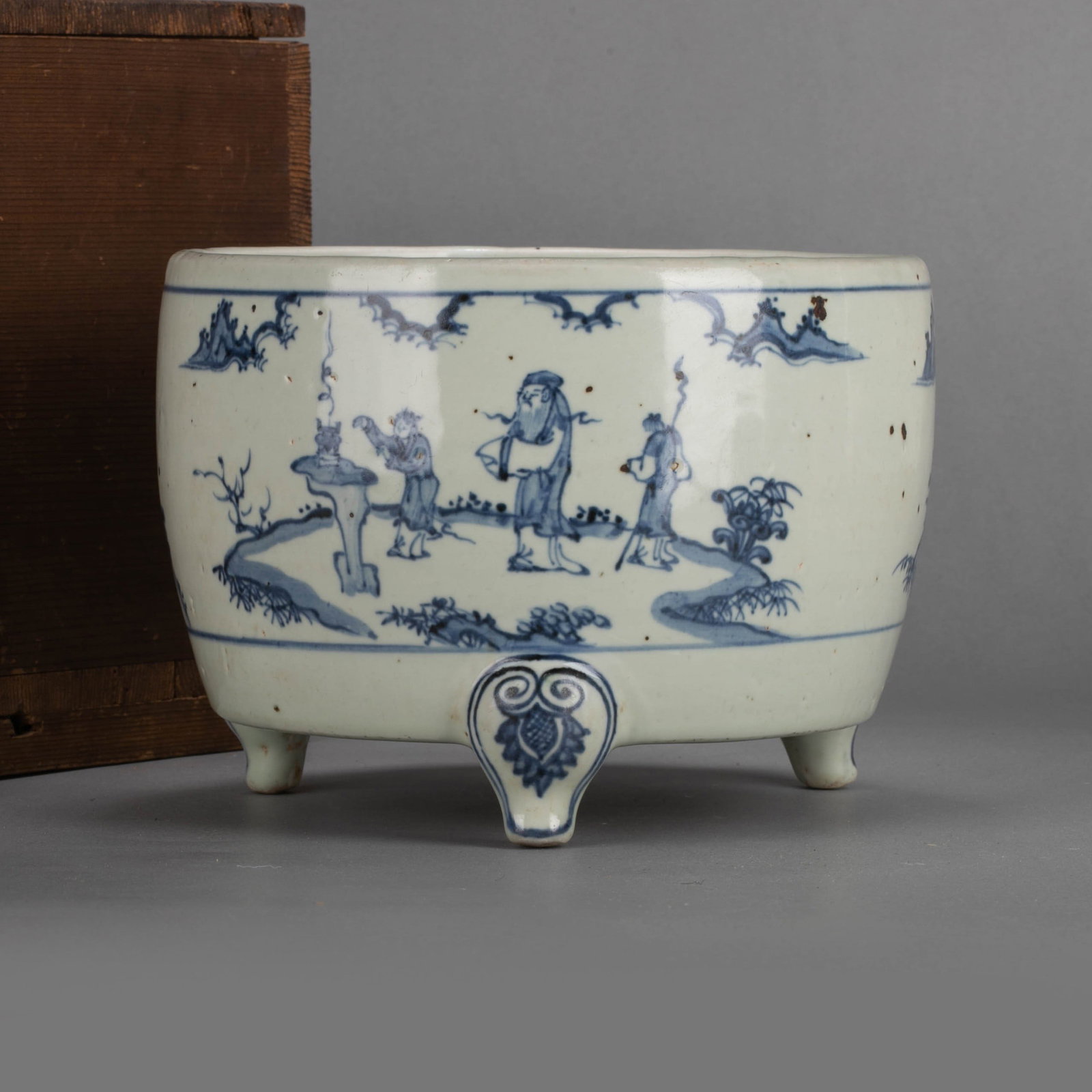 Ming Dynasty ancient dyed Incense Burner with figure pattern: This ancient Ming Dynasty dyed incidental incense burner with human figures has a straight mouth, short neck, plump shoulders, bulging belly, and three Ruyi cloud-like head-like feet. The overall