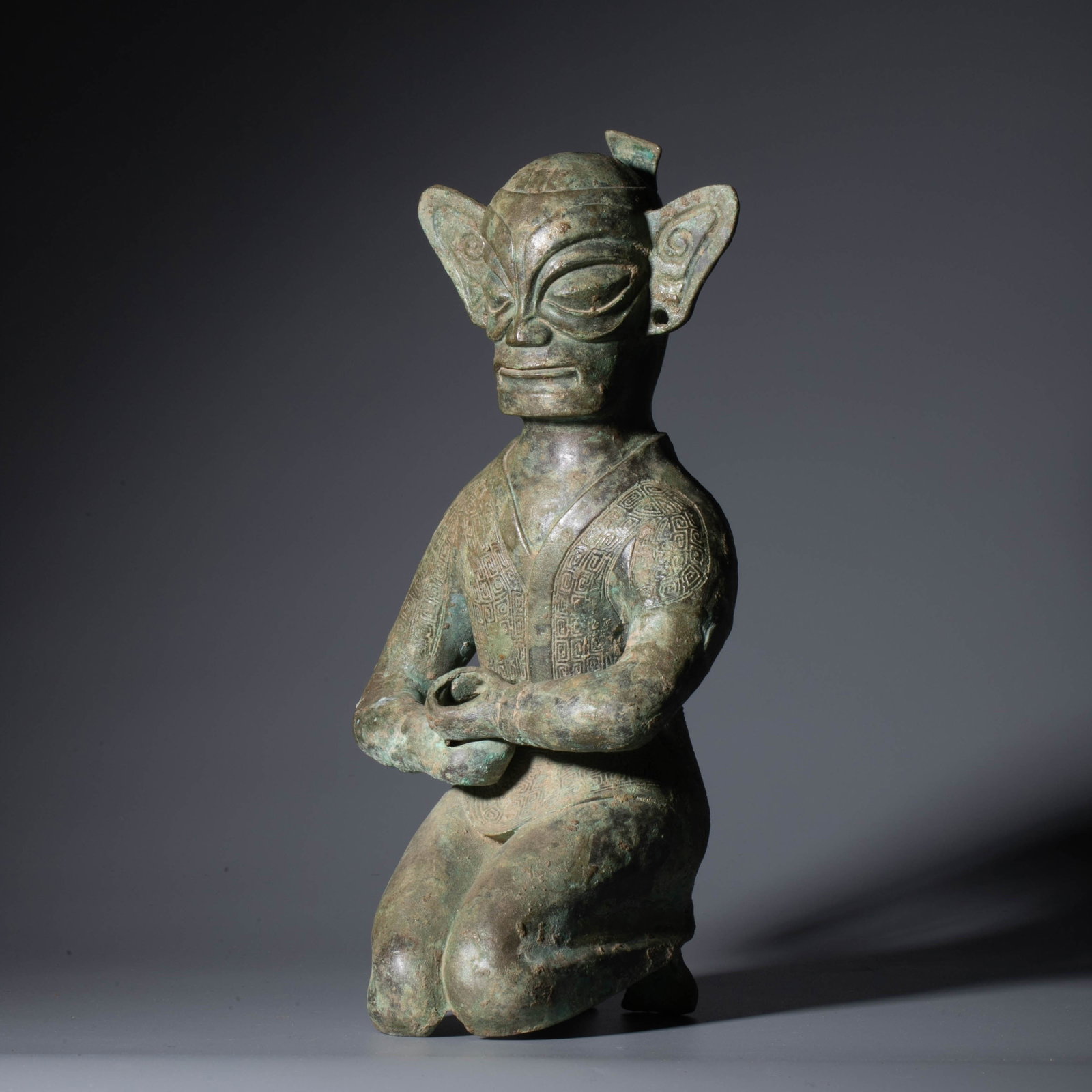 Shang Dynasty bronze kneeling figurine (1 of 8)