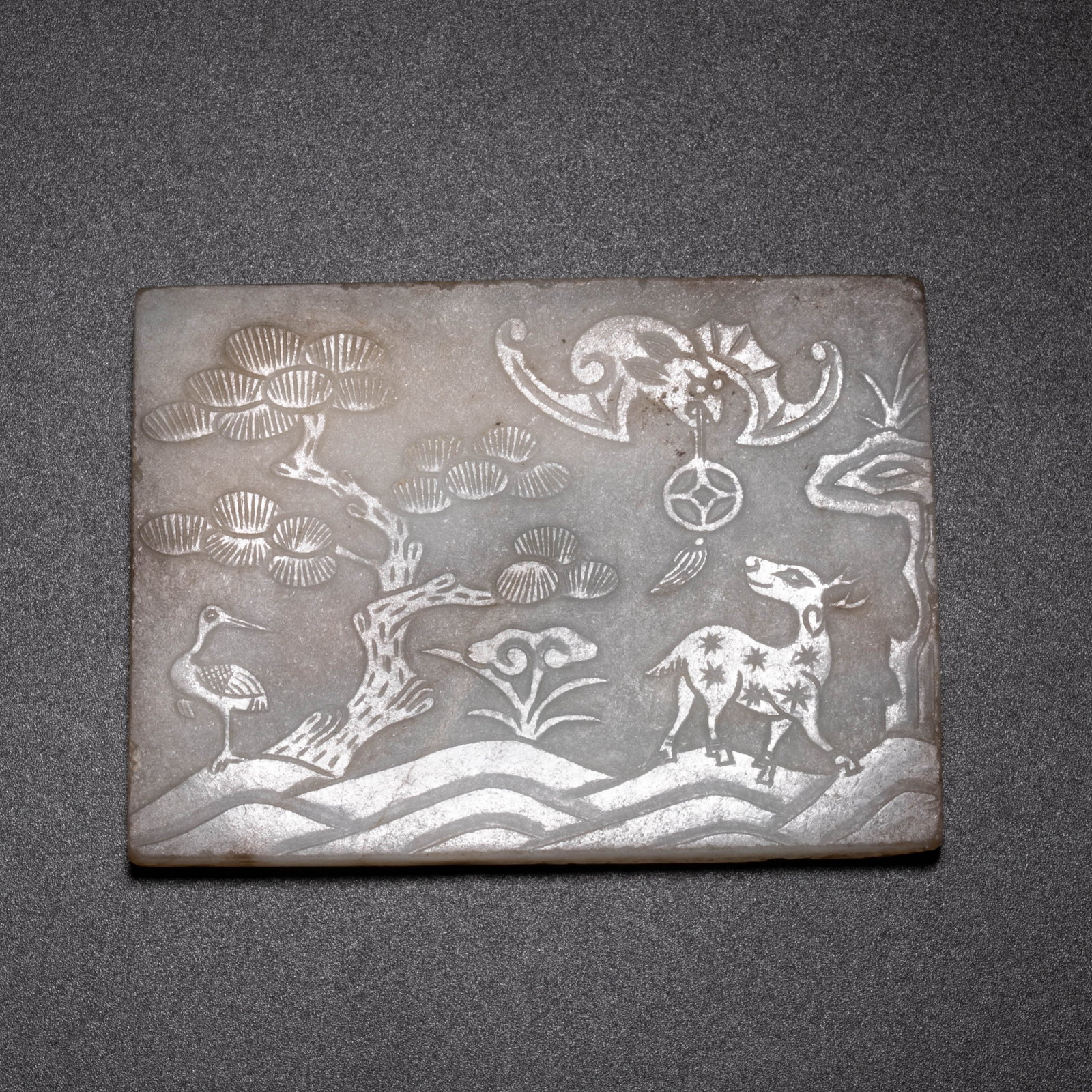 Qing Dynasty white jade incised flower pendant: Qing Dynasty white jade incised flower pendant