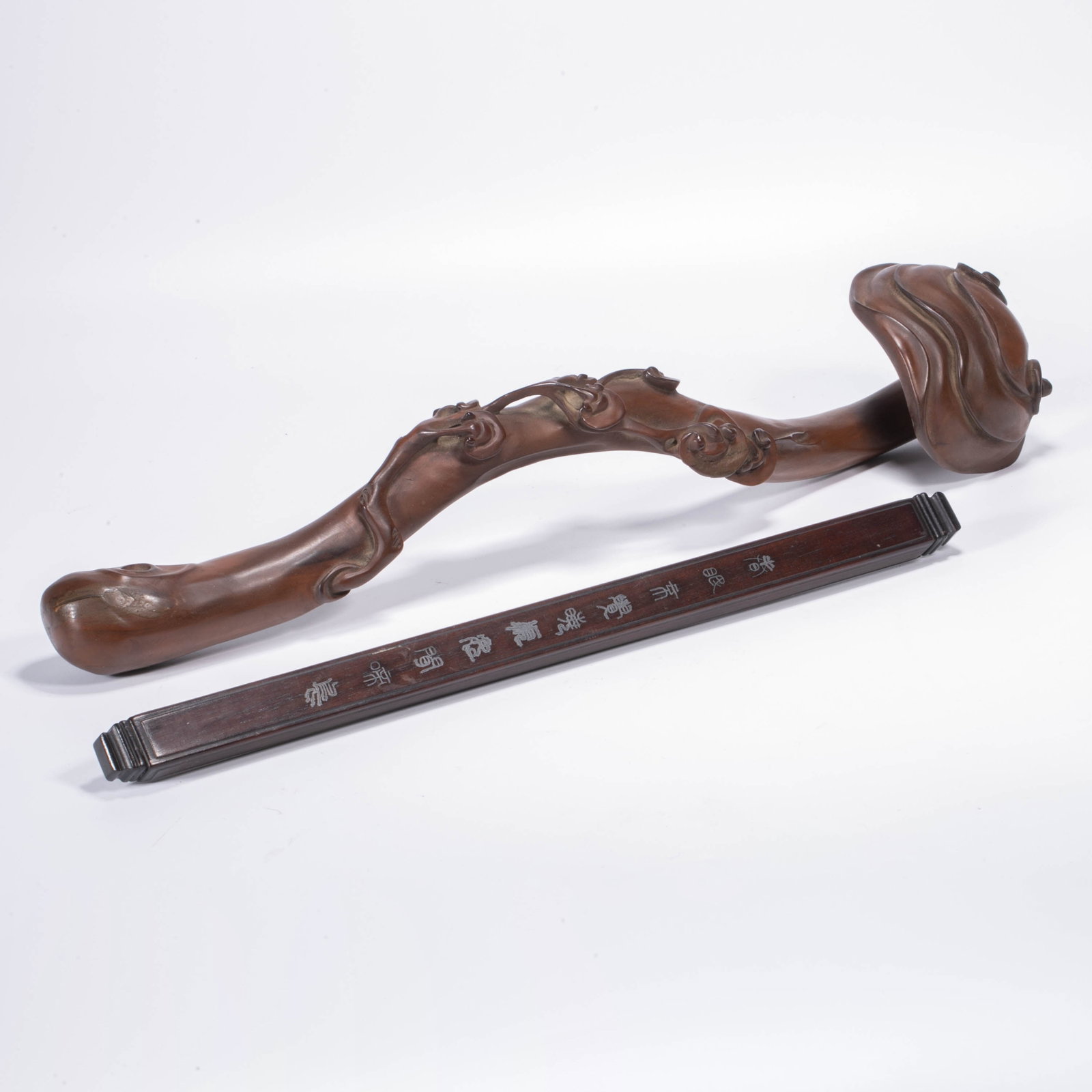 Boxwood carving Ruyi mahogany inlaid silver inscription paperweight: Boxwood carving Ruyi mahogany inlaid silver inscription paperweight