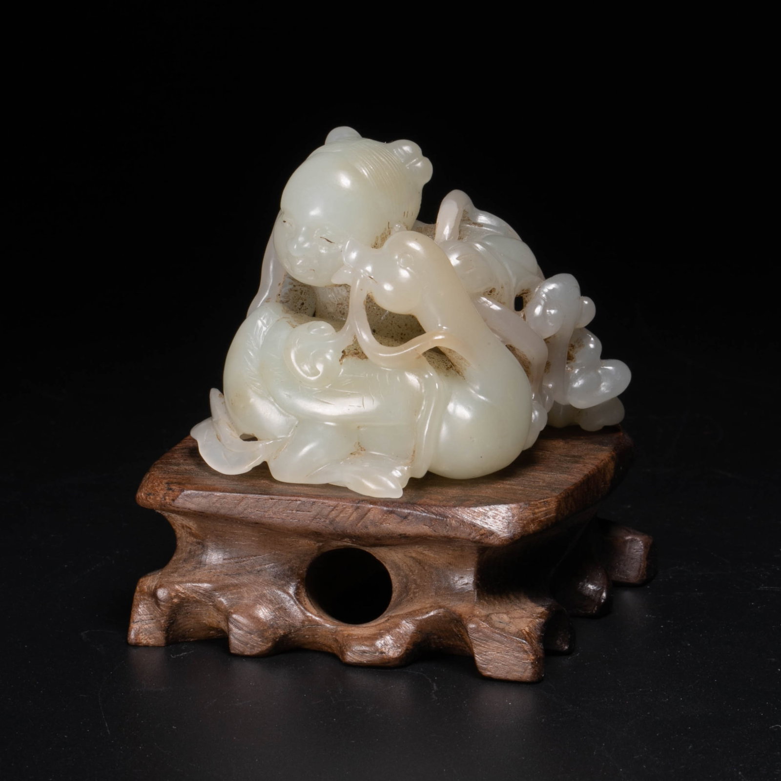 Hotan jade carving of boy playing with goose (1 of 6)