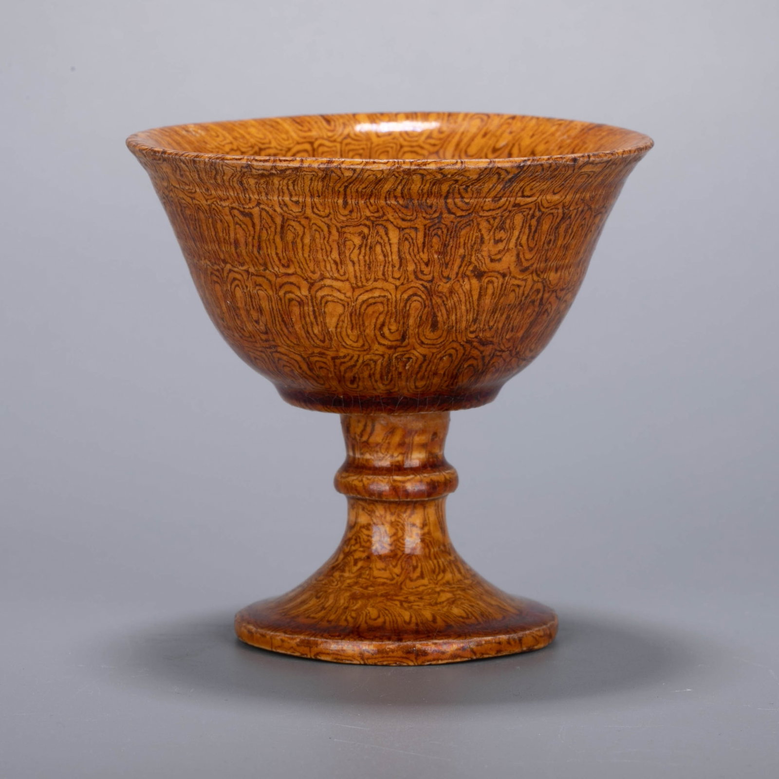 Tang Dynasty yellow glaze twisted goblet: Tang Dynasty yellow glaze twisted goblet