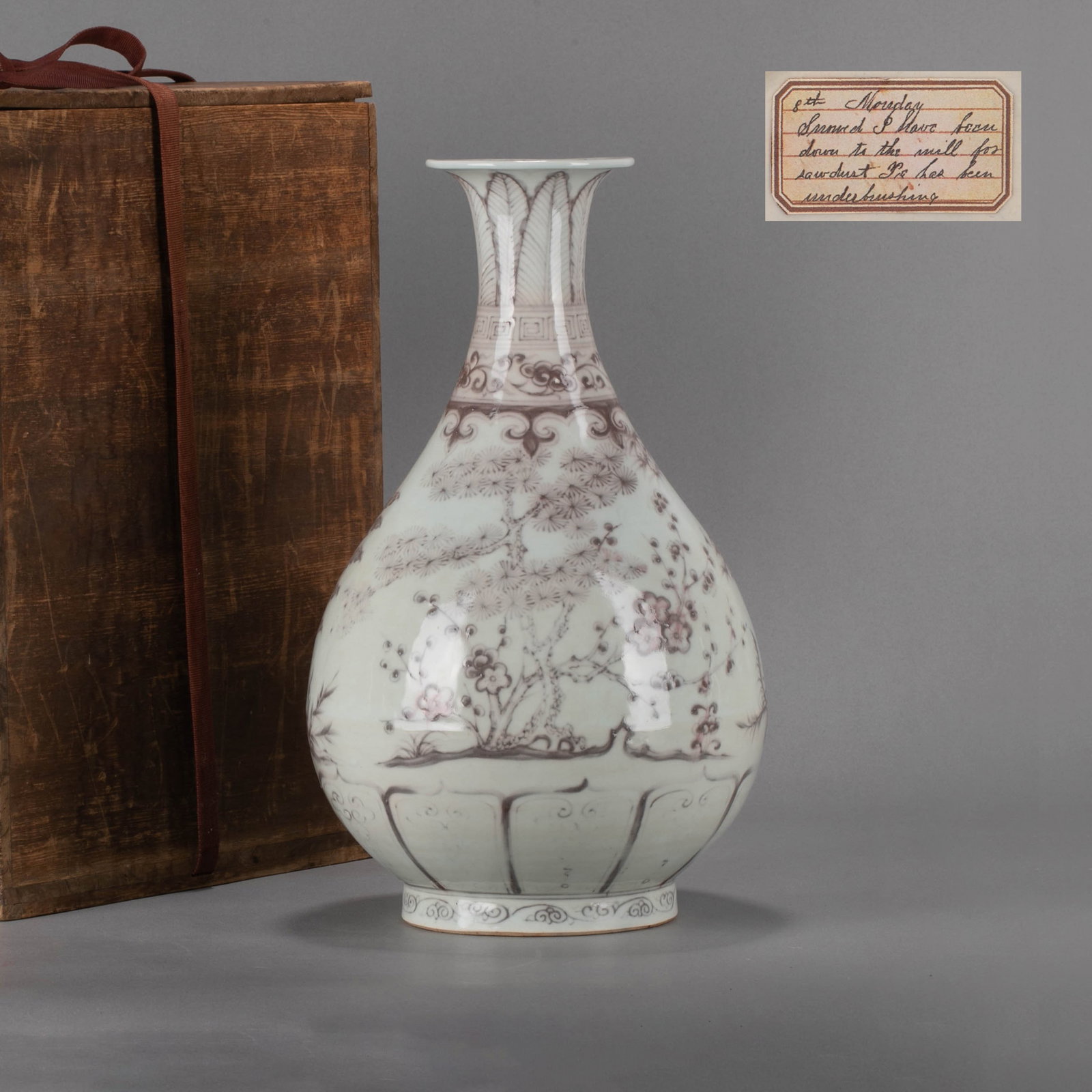 Ming Dynasty Hongwu Underglaze Red Flower Pattern Jade Huchun: This is a Hongwu jade vase with red flower pattern under glaze in the Ming Dynasty. It is made of pure white and delicate porcelain clay, and the glaze is shiny and slightly bluish. The body of the bo