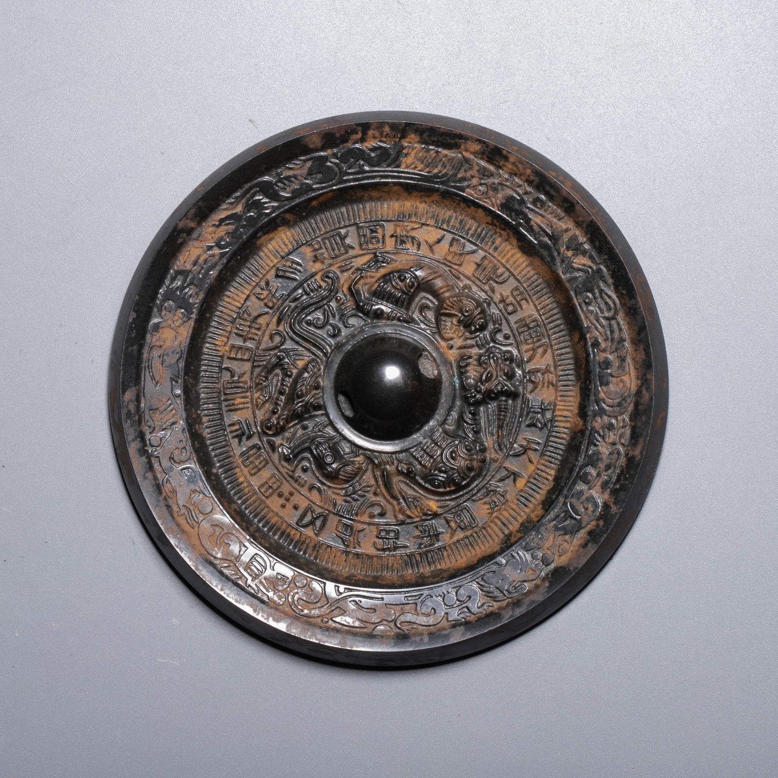 Bronze mirror with inscriptions on mythical beasts: Bronze mirror with inscriptions on mythical beasts