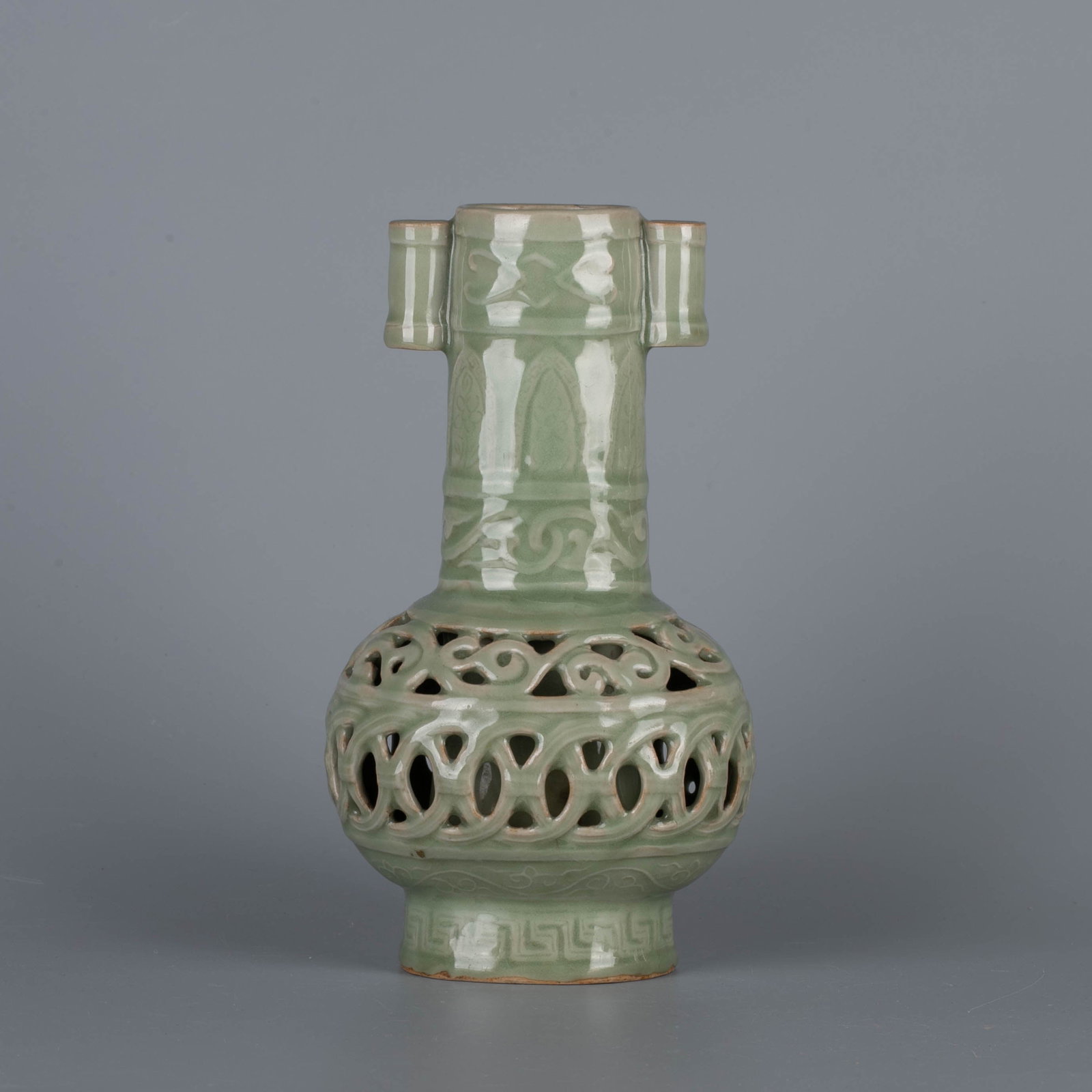 Ming dynasty celadon hollow ear vase: Ming dynasty celadon hollow ear vase