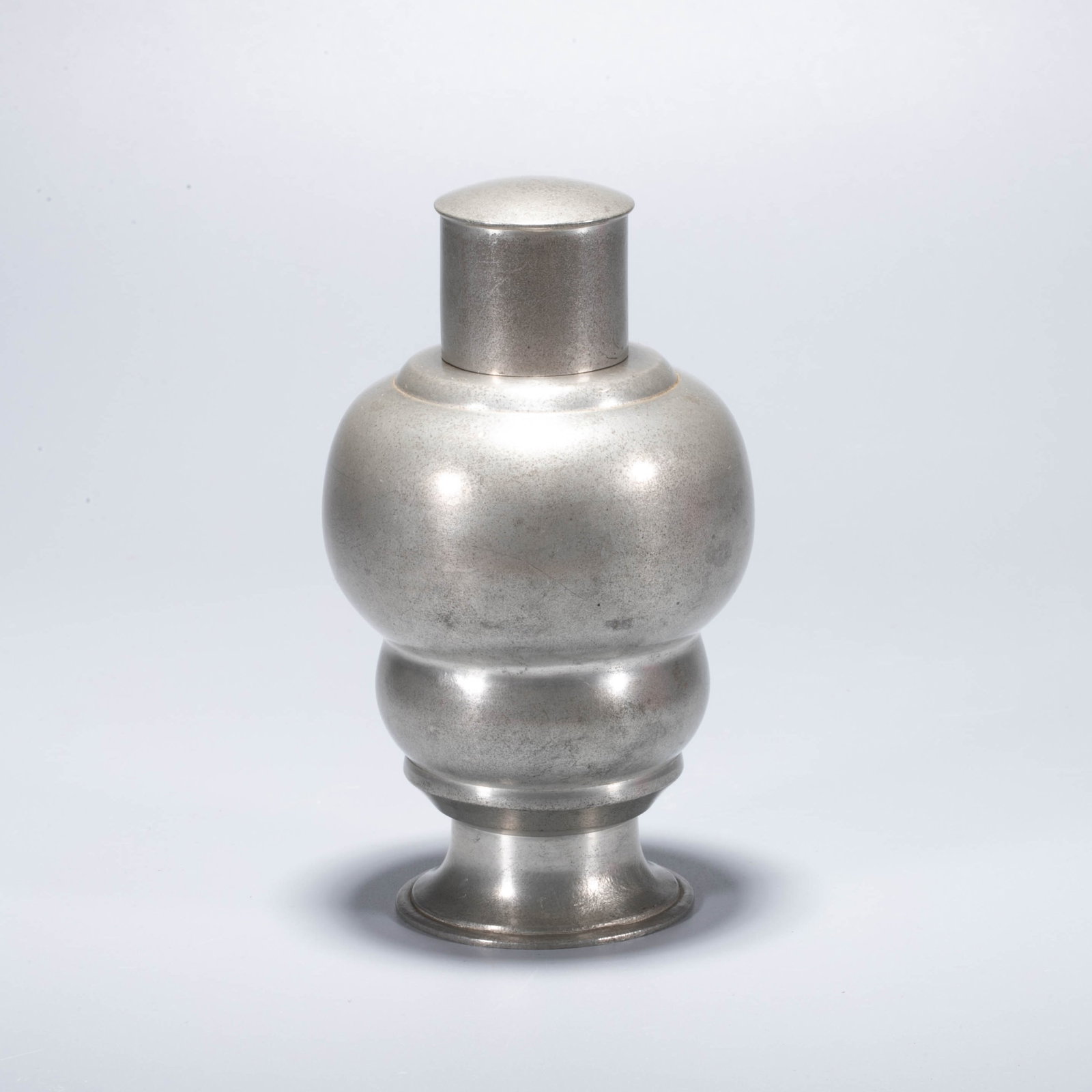 A Gourd-Shaped Pewter Tea Caddy: A Gourd-Shaped Pewter Tea Caddy