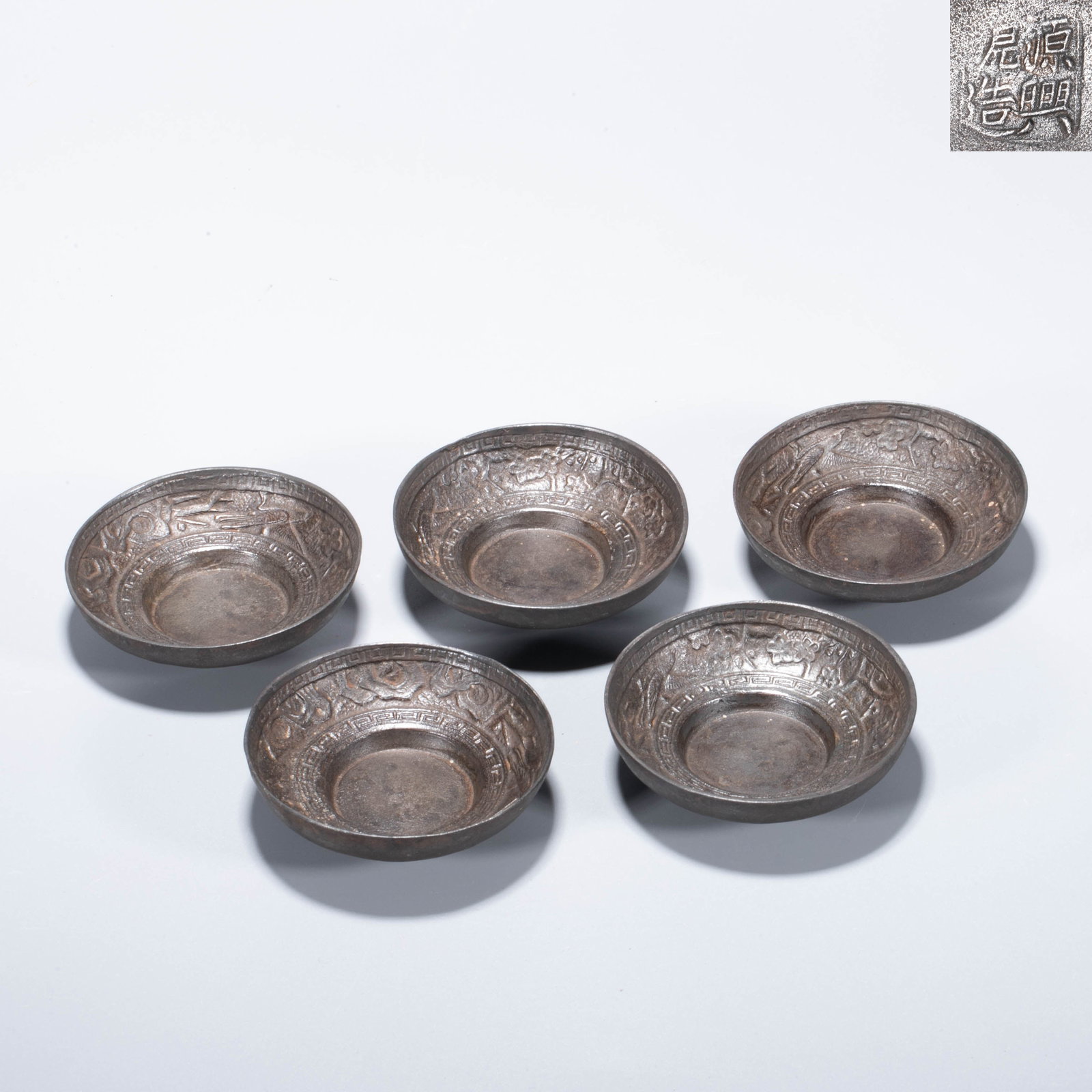 A Set of Five Pewter Tea Saucers by Genko Kon, Decorated with Plum Blossoms and Cranes: A Set of Five Pewter Tea Saucers by Genko Kon, Decorated with Plum Blossoms and Cranes