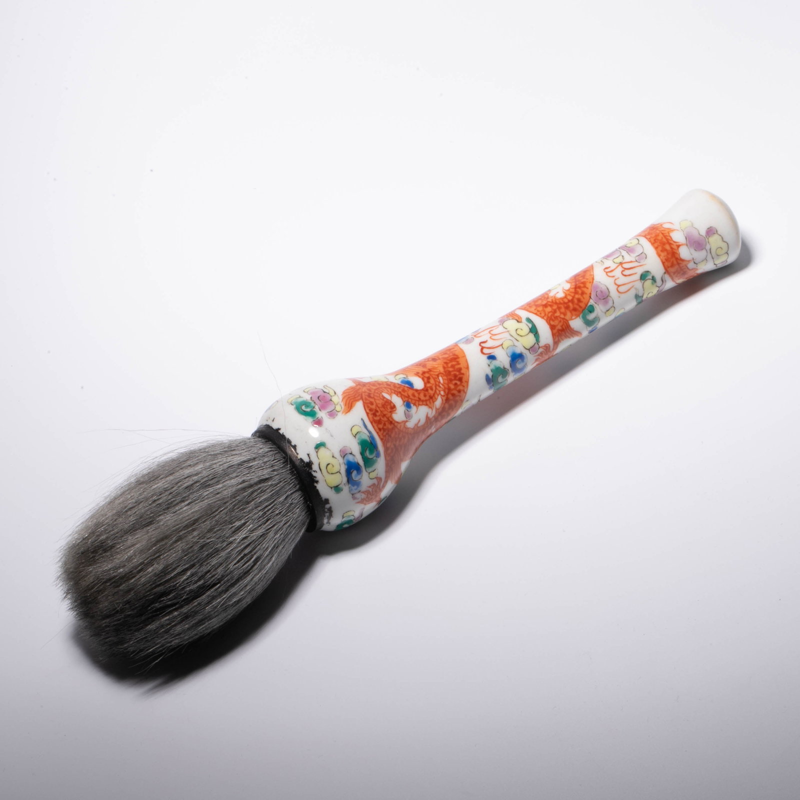 Qing Dynasty alum-red dragon-motif porcelain brush: Qing Dynasty alum-red dragon-motif porcelain brush