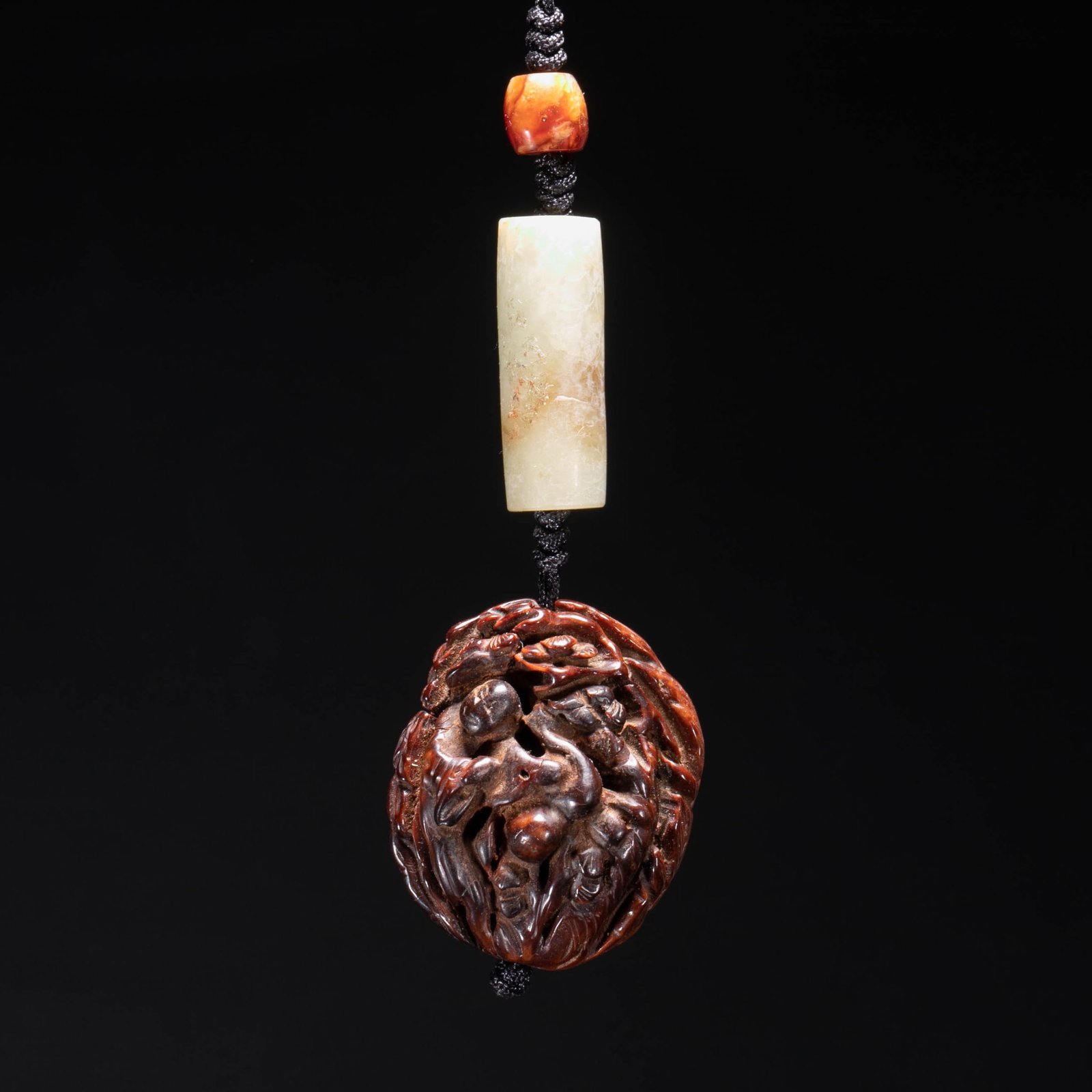 nut carving figural pendant (1 of 6)