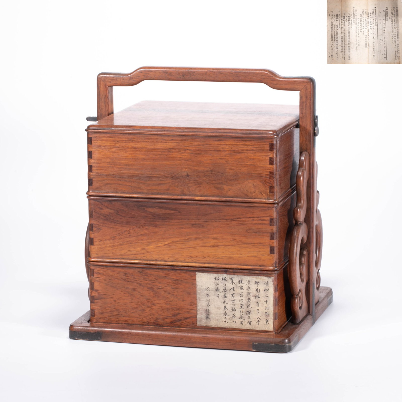 Qing Kangxi huanghuali suitcase: This item is a three-layer huanghuali carrying box. The wooden box attached is inscribed with the title "Qing Kangxi Huanghuali Three-Layered Carrying Box". It is recorded that it was obtained from