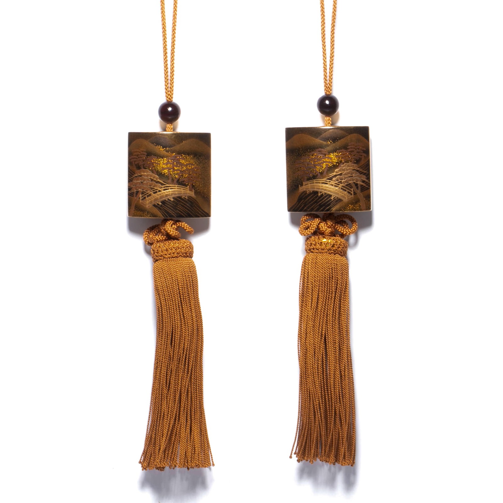 Pair of Japanese gold maki-e fuchin weights: Pair of Japanese gold maki-e fuchin weights