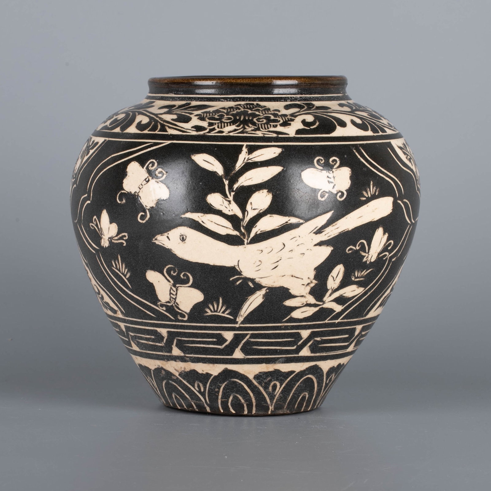 Song Cizhou ware Black ground and white flowers jar: Song Cizhou ware Black ground and white flowers jar