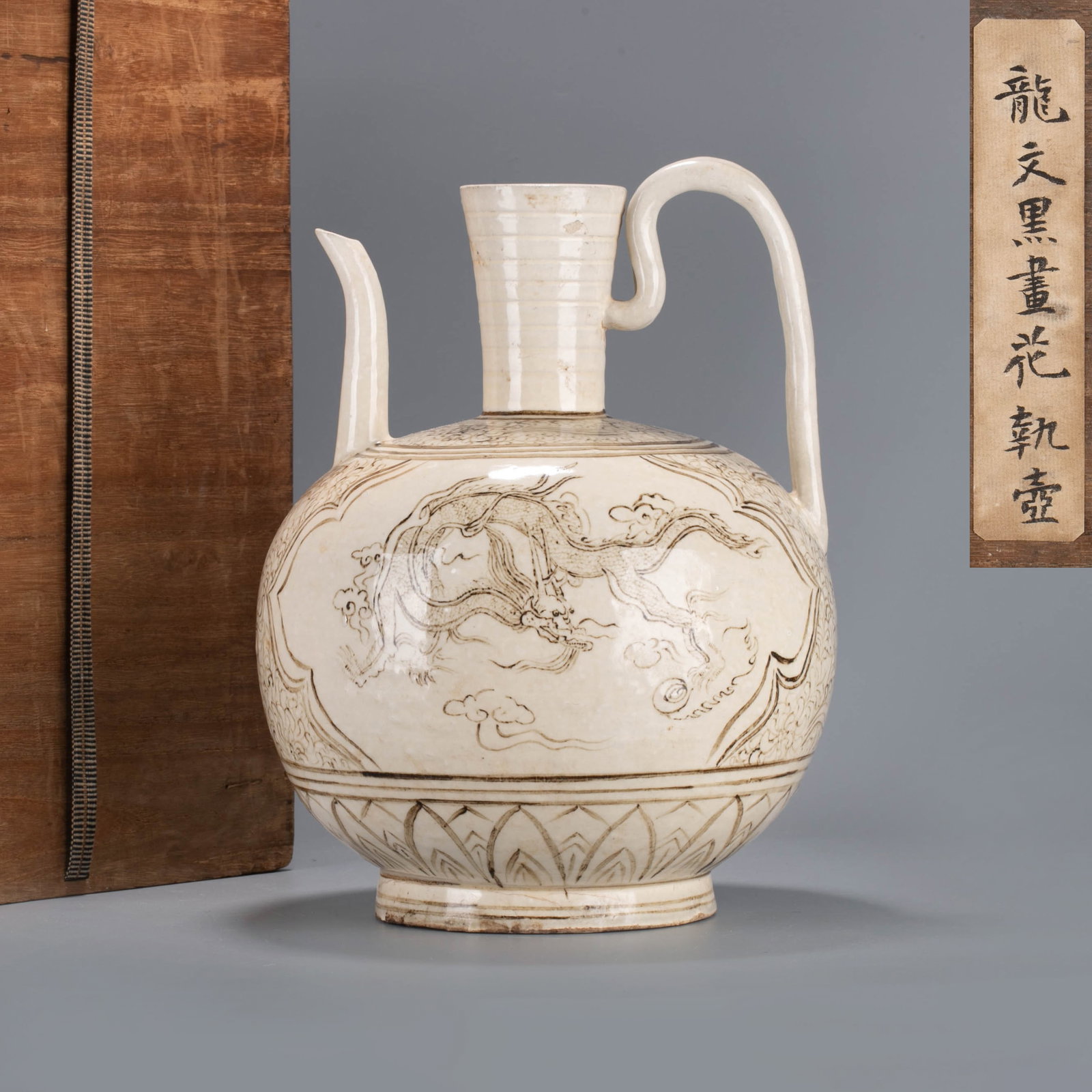Cizhou ware white-ground brown-painted phoenix-pattern ewer: Cizhou ware white-ground brown-painted phoenix-pattern ewer
