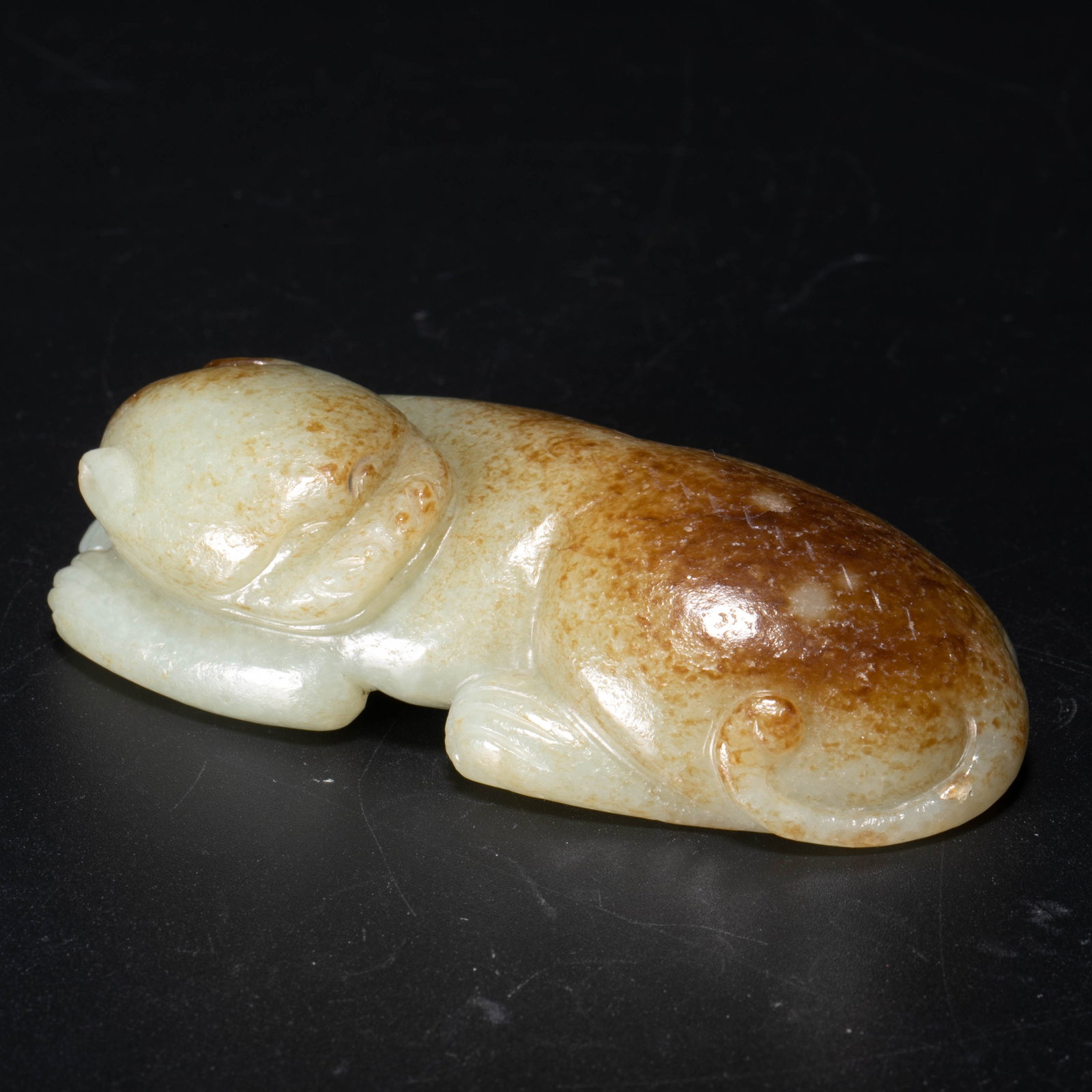 Hetian celadon jade ornament with russet skin and auspicious beast motif (1 of 4)