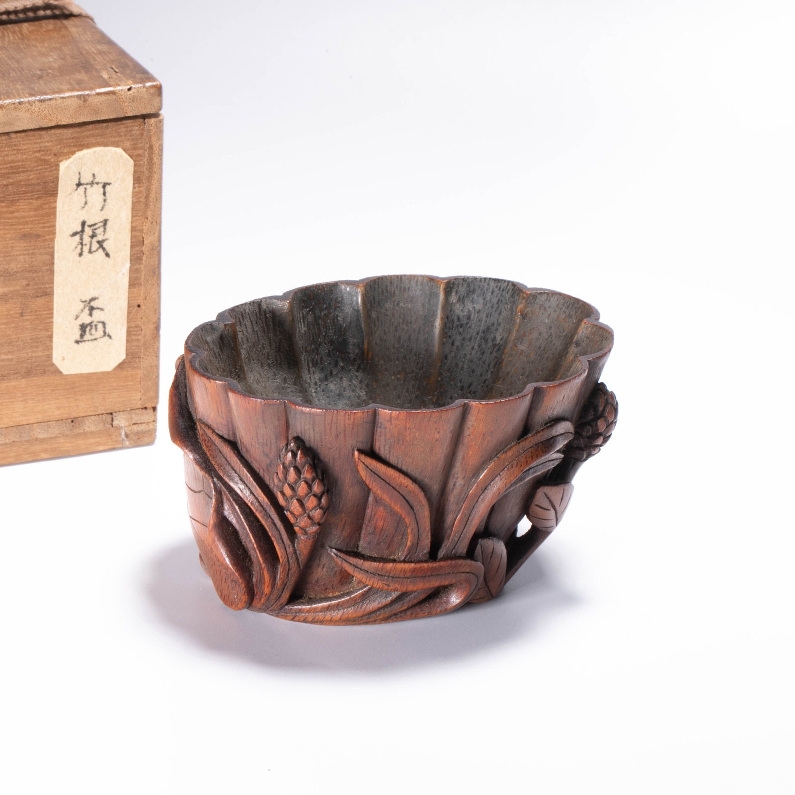 Bamboo-root carved floral cup: Bamboo-root carved floral cup