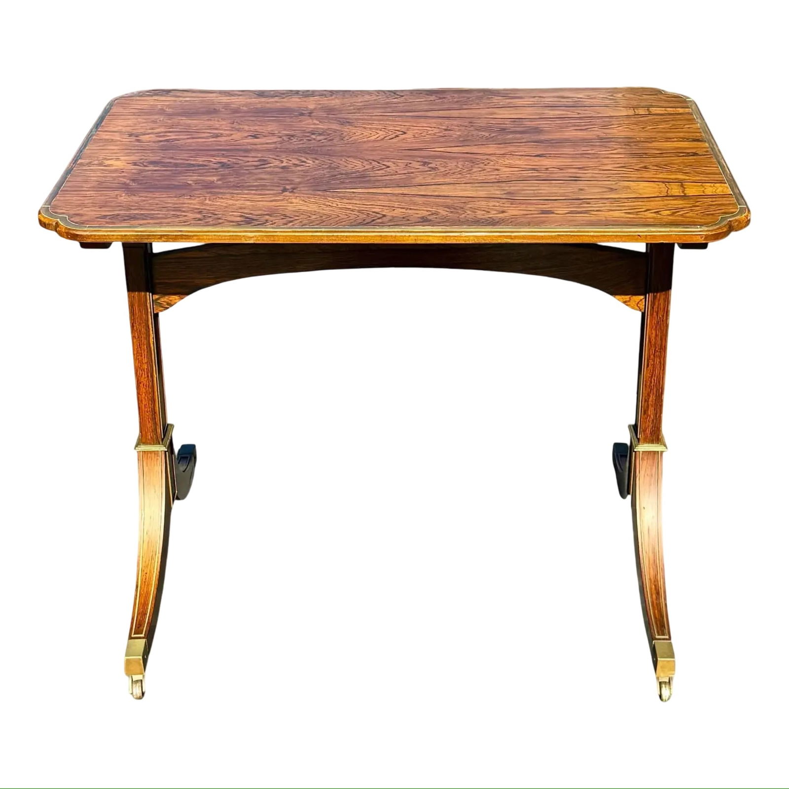 Baker Woburn Abbey Regency Table: Baker Woburn Abbey Regency Table A vintage Baker Furniture table from the Woburn Abbey Collection, Regency style. Features brass inlay detailing and a figured wood-grain top. Trestle-form legs fitted
