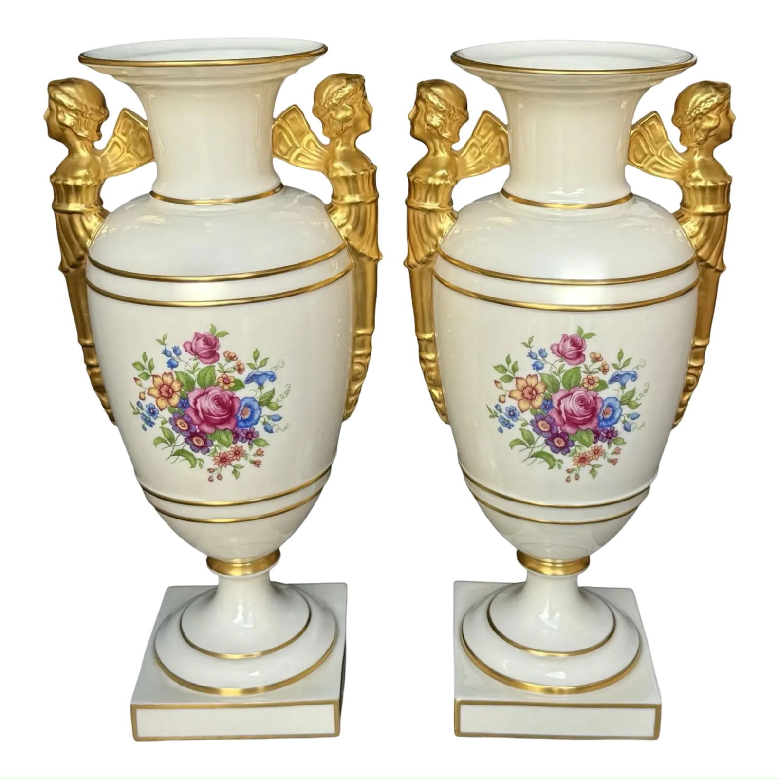 Lenox Empire Cherub Vases, Pair: Lenox Empire Cherub Vases, Pair A pair of Lenox porcelain Empire vases with gold cherub handles and hand-painted floral design. Both vases are marked on the base with the official Lenox maker’s mark