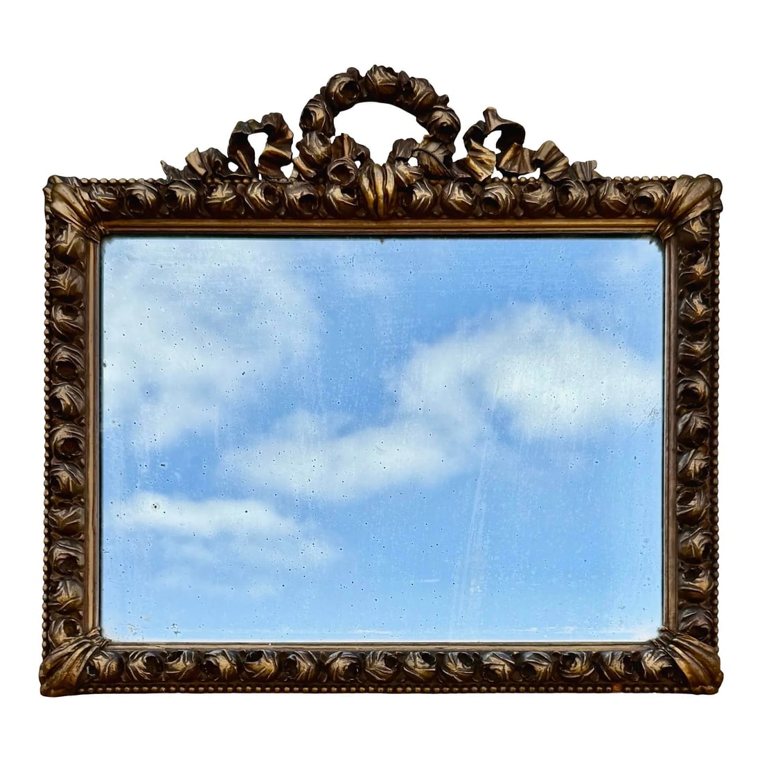 Antique Italian Florentine Mirror: Antique Italian Florentine Mirror Antique Italian Florentine wall mirror set in a carved wood frame with traditional Rococo motifs. Dimensions: 20?W × 1.5?D × 18?H