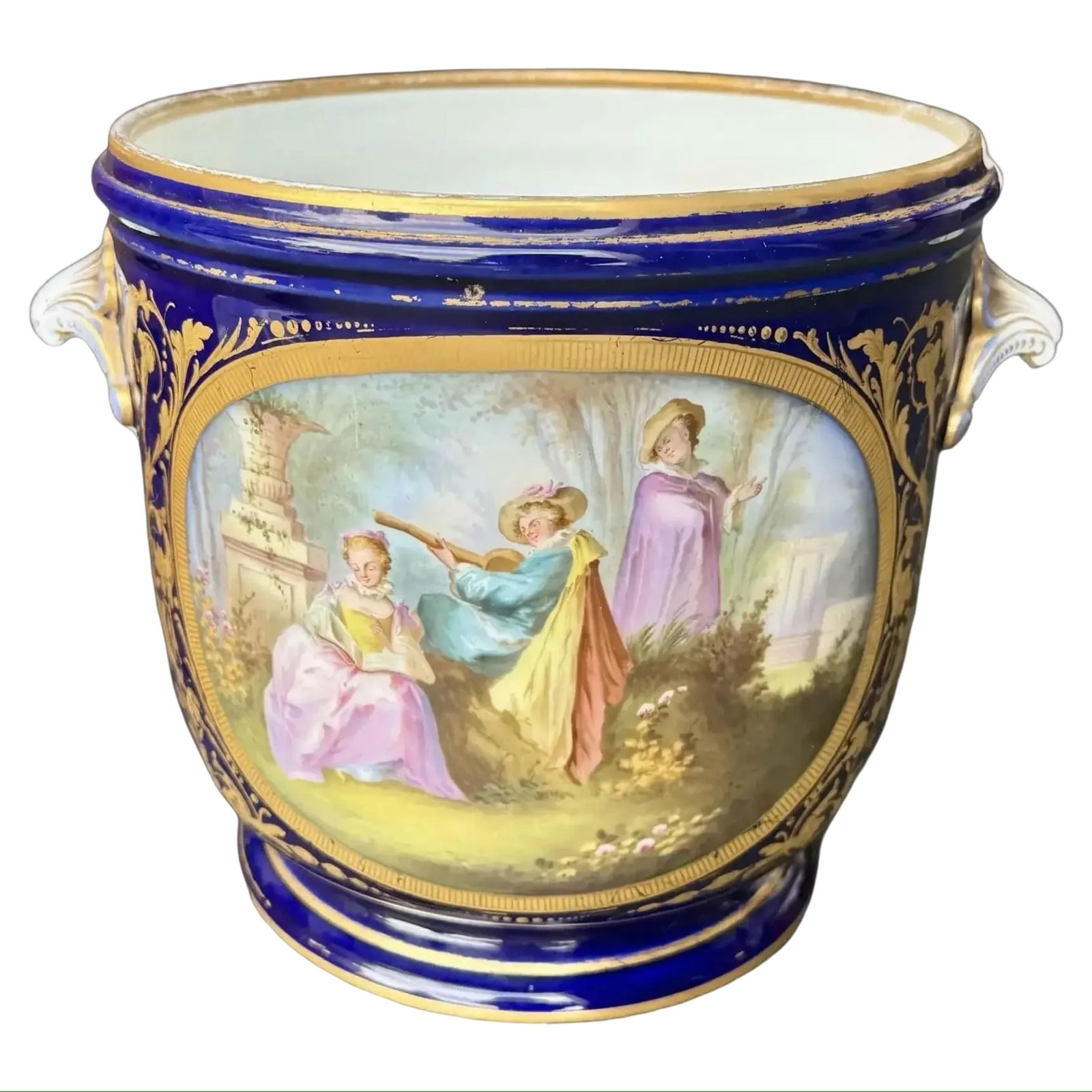 French Cachepot Jardiniere: French Cachepot Jardiniere Large French polcelain cachepot with a cobalt blue exterior and shell-shaped gilt handles. Dimensions: 9?W × 9.5?D × 11.5?H