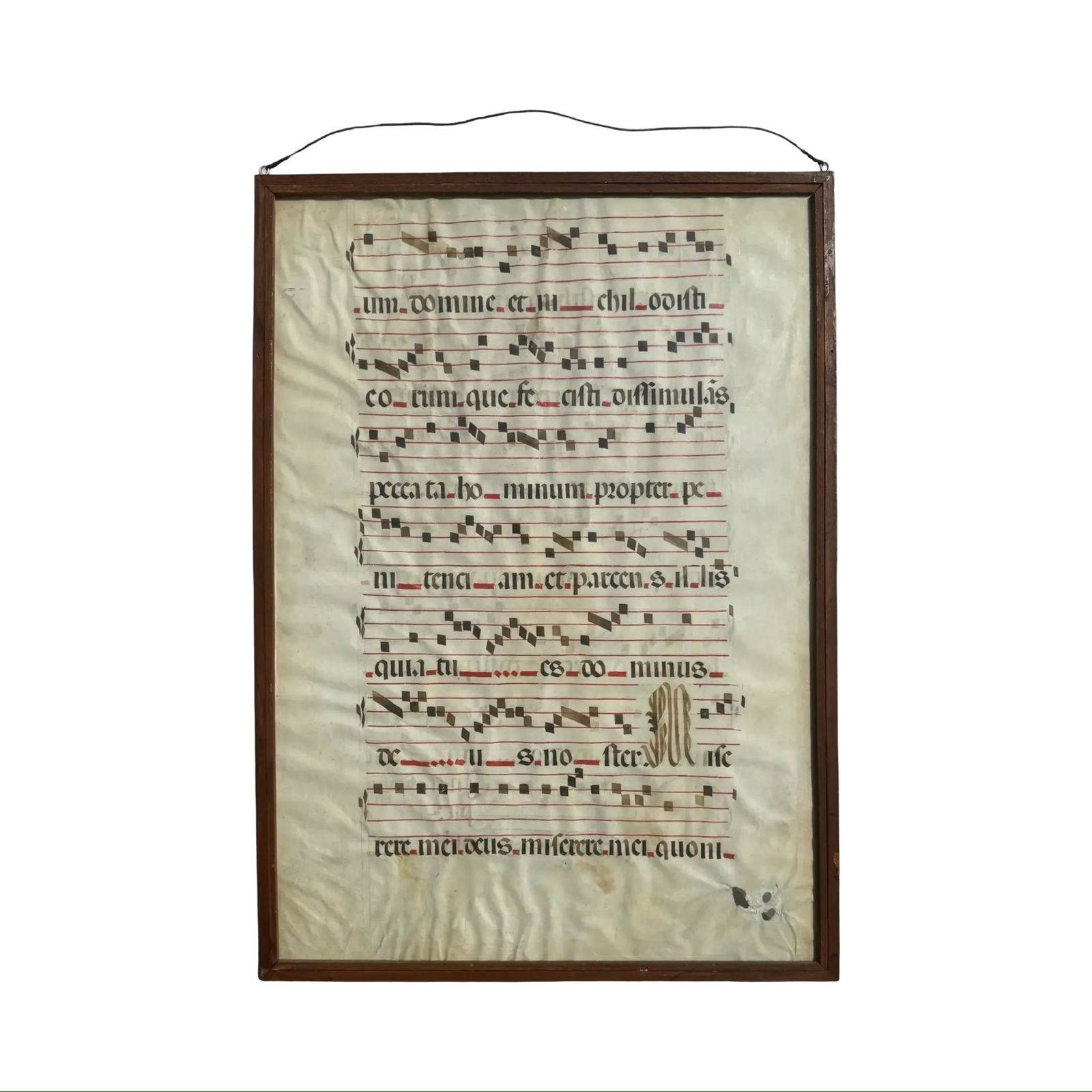 Medieval Antiphonary Vellum Leaf Framed: Medieval Antiphonary Vellum Leaf Framed Large antique vellum leaf from a medieval antiphonary featuring early musical notation and calligraphic liturgical text, double-sided and displayed in a