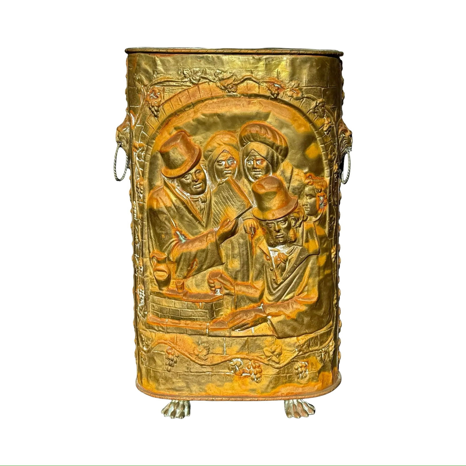 Victorian Repoussé Umbrella Stand: Victorian Repoussé Umbrella Stand Antique Victorian-era umbrella stand crafted from embossed metal, featuring a repoussé relief, lion-head ring handles, and claw feet. Dimensions: 17?W × 9.75?D ×