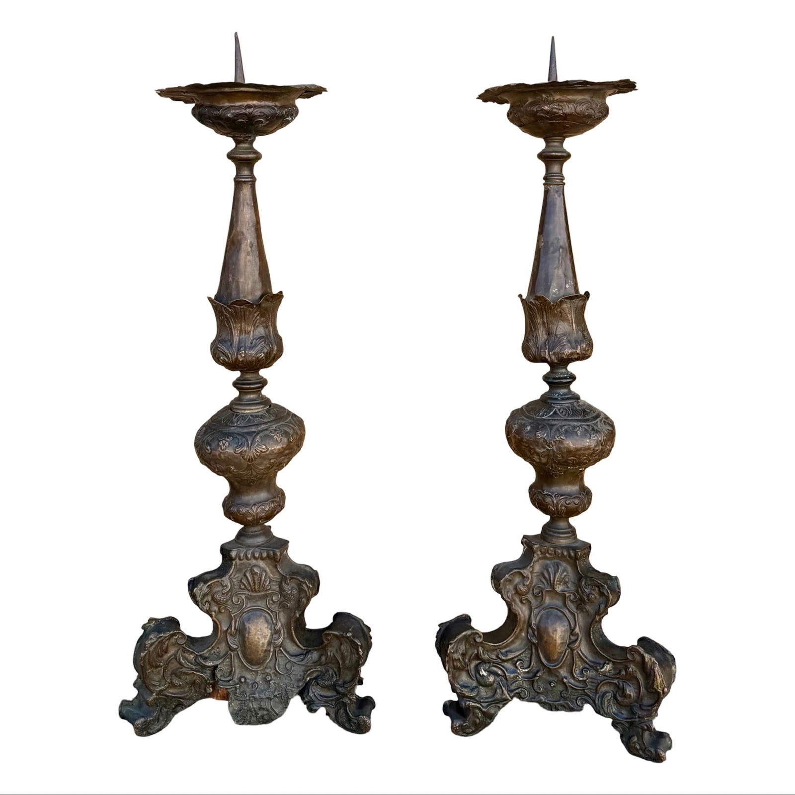 Antique Baroque Altar Prickets Pair: Pair of antique Baroque altar pricket candlesticks with pressed metal over wood tripod bases, dating to the 18th century. Decorative church candlesticks with triform bases and foliate detailing.