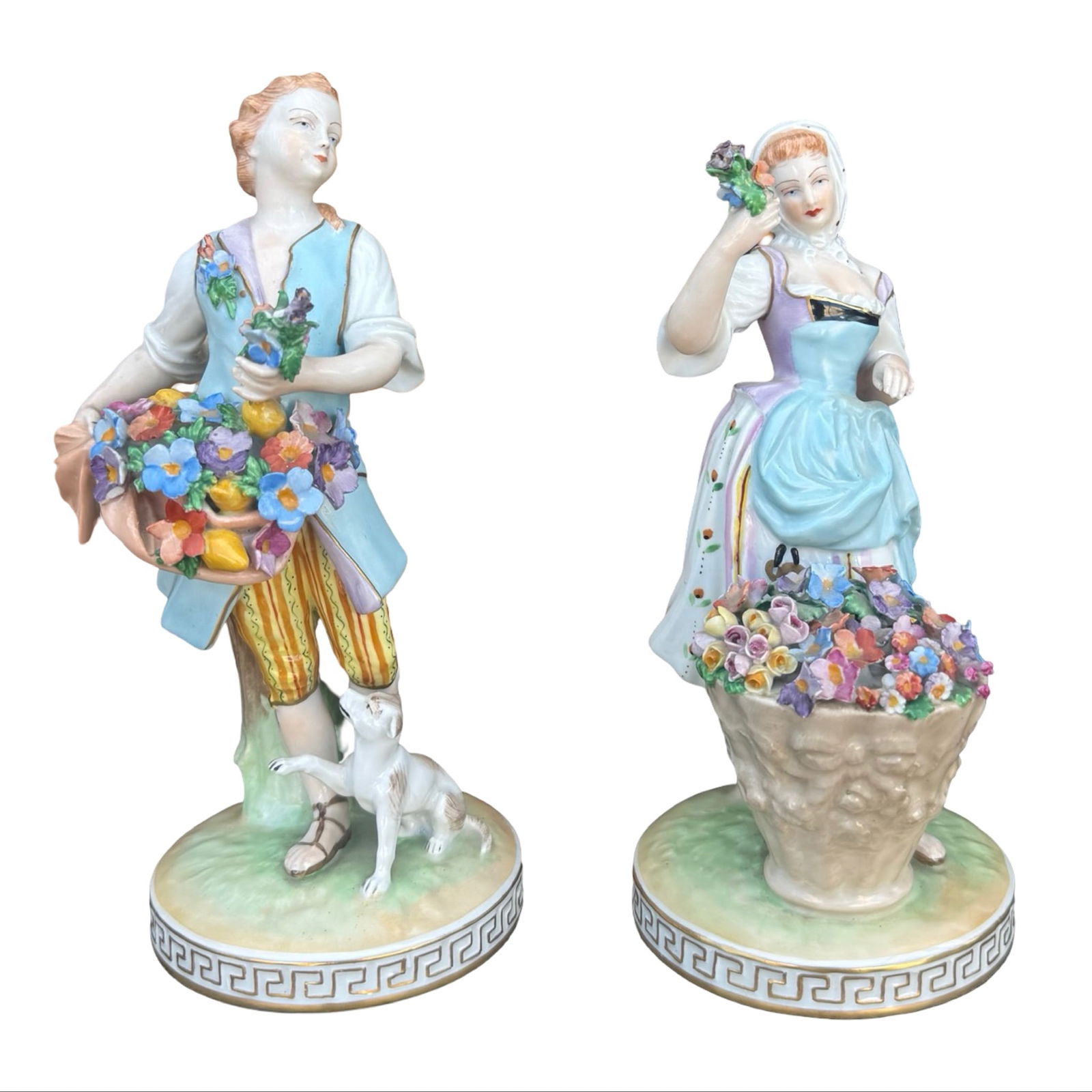 Dresden Carl Thieme Flower Sellers Pair: Pair of Dresden porcelain figurines attributed to Carl Thieme, of flower sellers with hand-painted floral elements and gilt detailing. Each is marked on the base. Dimensions: 8.5H x 4.5W x 4.5D