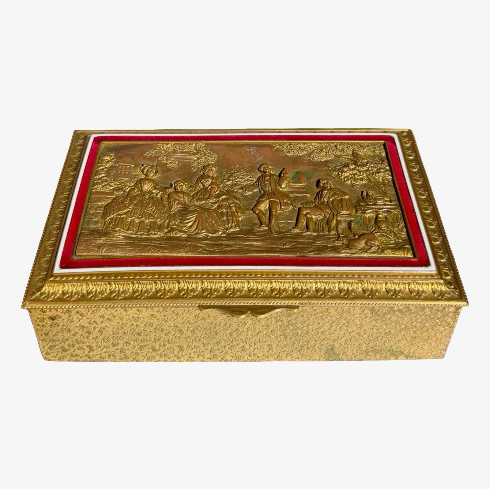 Ovington French Bronze Repousse Box: Antique gilt bronze casket box by Ovington New York with repoussé pastoral scene, red enamel border, and wood lined interior. French made. Stamped on interior of the lid. Dimensions: 1.5H x 5.5W x 3.