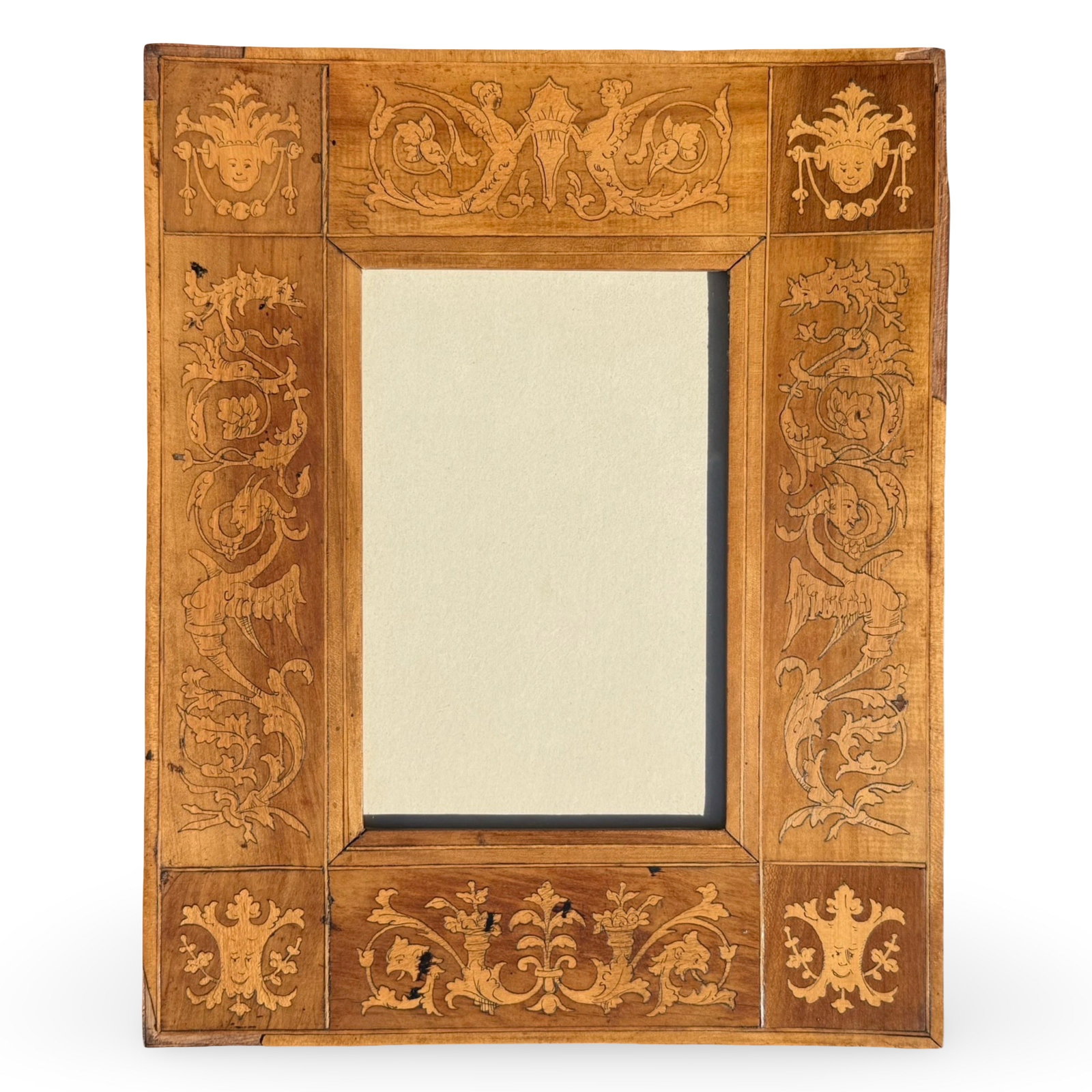 Sorrento Marquetry Inlaid Frame: Italian Grotesque Inlaid Frame Italian Renaissance Revival wooden frame with intricate marquetry inlay and classical foliate scrollwork. Featuring grotesque masks, floral motifs, and crest elements; l