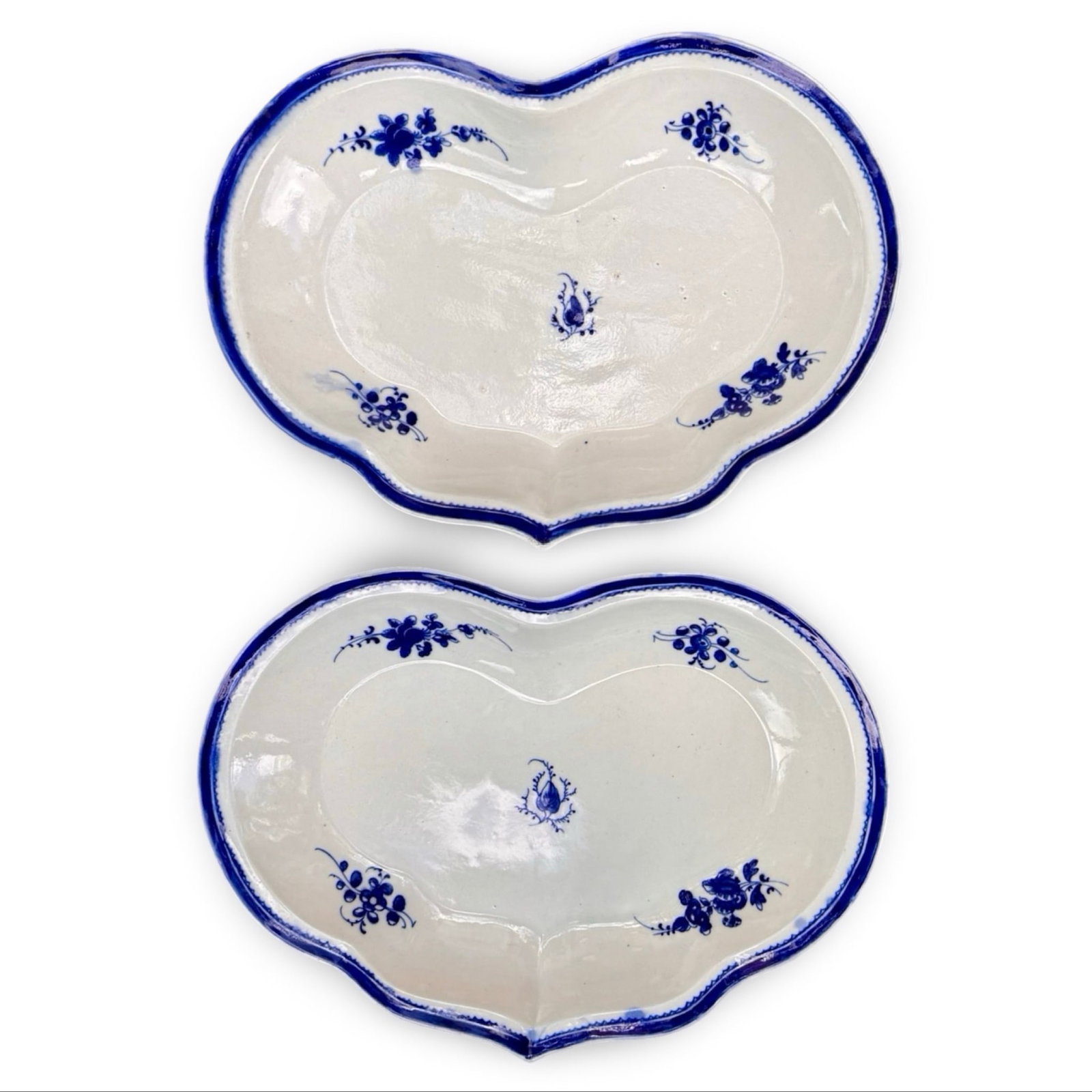 18C Caughley Salopian Heart Dishes: Pair of 18th-century Caughley Salopian heart porcelain dishes with blue Chantilly decoration. Marked on bases. Approx. Dimensions: 1.5H x 11W x 7.5D