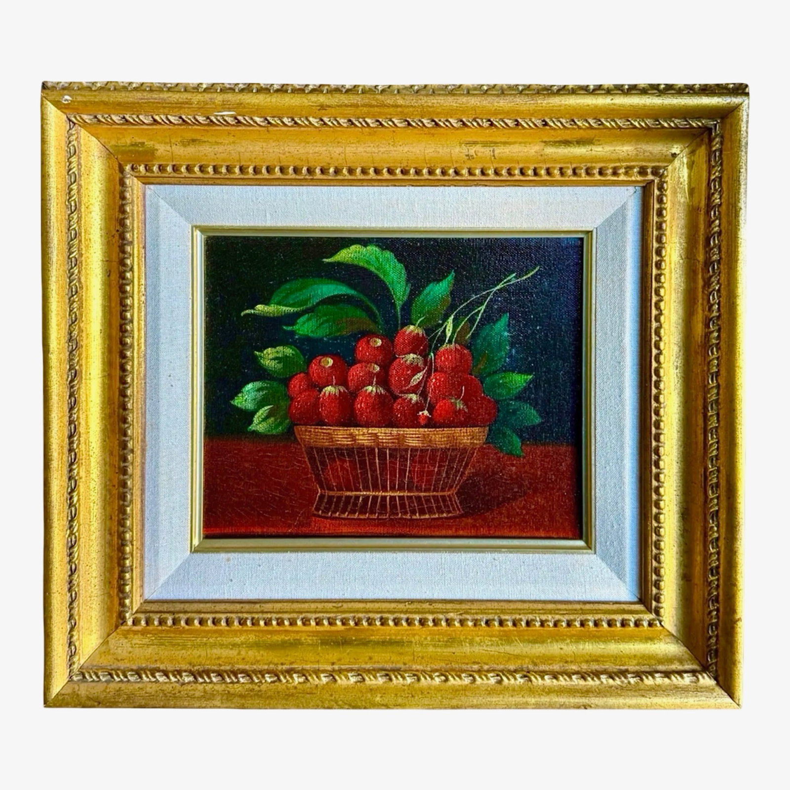 Strawberries Still Life Oil Painting: Still life oil painting of a tabletop fruit scene with strawberries. basket of strawberries on a tabletop. Oil on canvas. Set in a carved gilt wood frame. Approx. Dimensions: 16.75W × 1.5D × 14.75H 