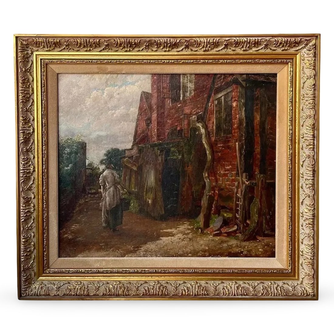 Antique European Village Painting: European oil on canvas painting of a village scene, set in a carved wood frame with gold gilt decoration. Approx. Dimensions: 15.75H x 18W x 1.25D inches