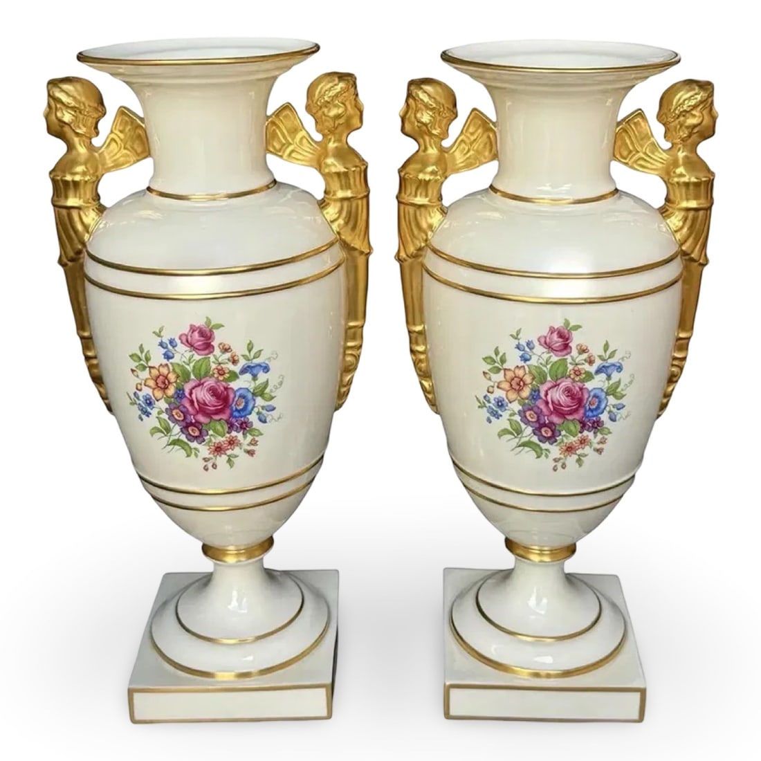 Lenox Empire Cherub Vases, Pair: Lenox porcelain Empire cherub vases pair with hand-painted floral design. Marked on the base and retain their original retail stickers from J.W. Robinson Co. Approx. Dimensions: 6.25W × 5.5D × 14H i