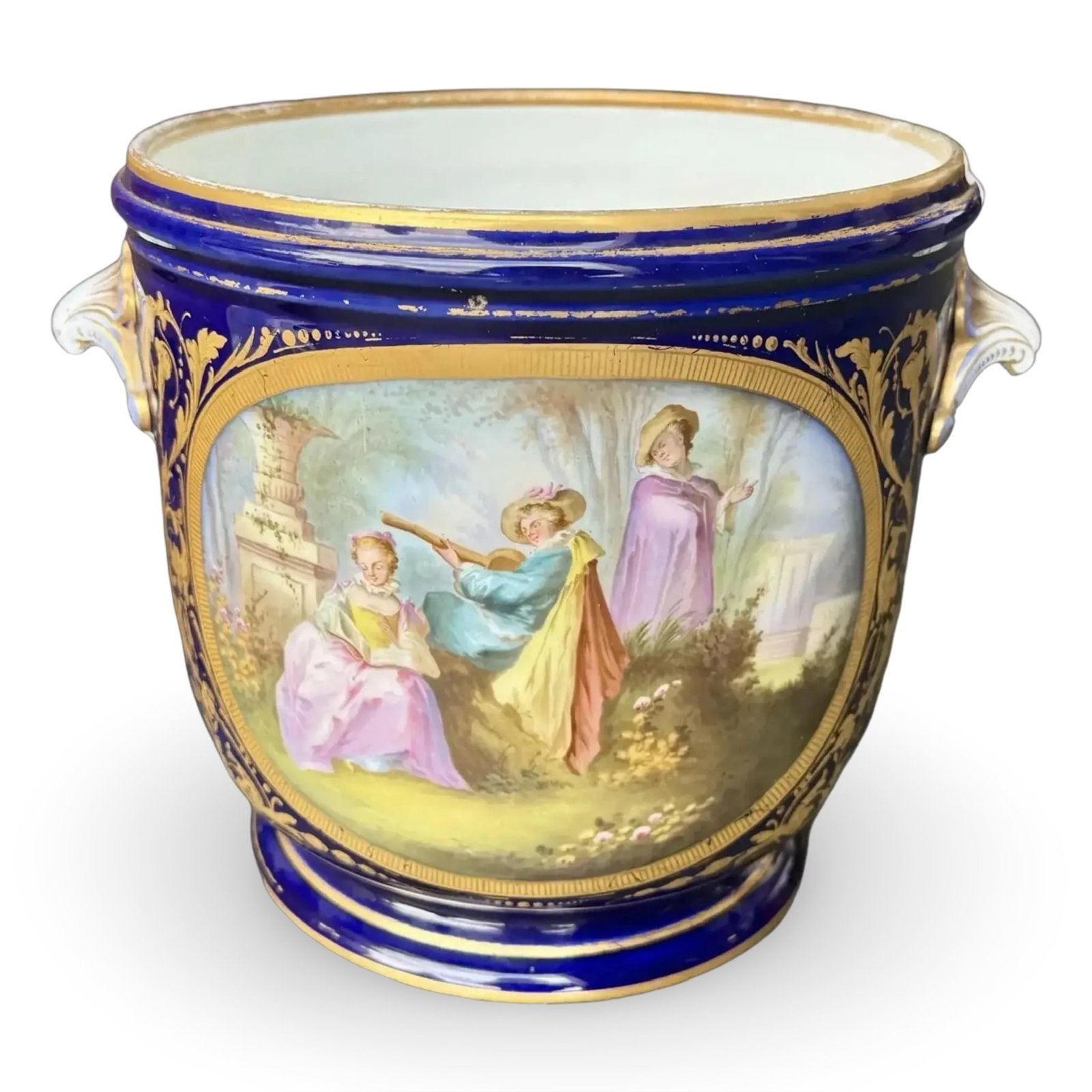 French Rococo Cachepot Jardiniere: French cachepot with cobalt blue ground, gilt accents, and figural landscape vignettes. Approx. Dimensions: 11.5W × 9.5D × 9H