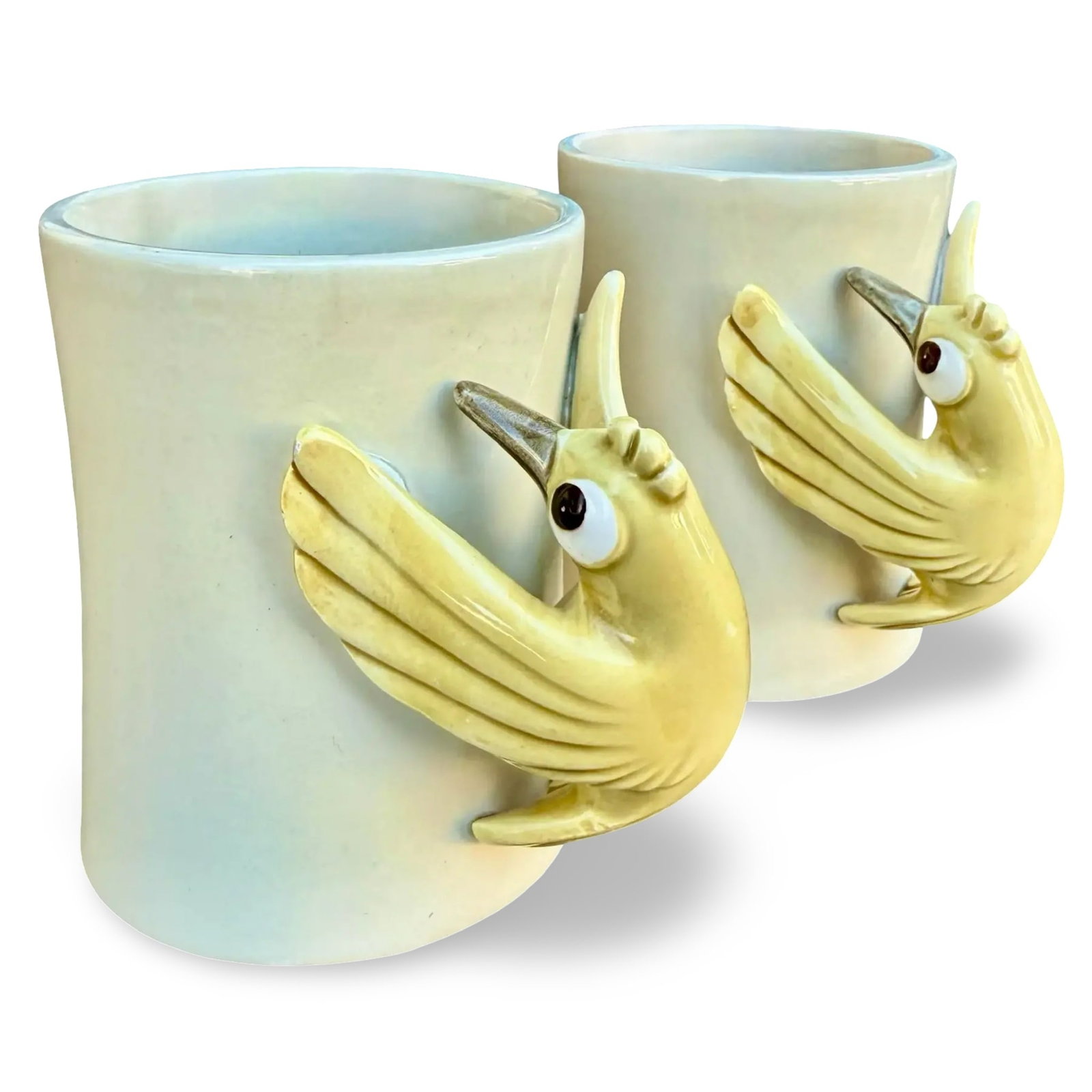Fitz Floyd Bird in Hand Mugs Pair: Pair of Fitz and Floyd Bird in Hand cups / mugs. Marked on bases. Approx. Dimensions: 3.75H x 4.5W x 3D inches