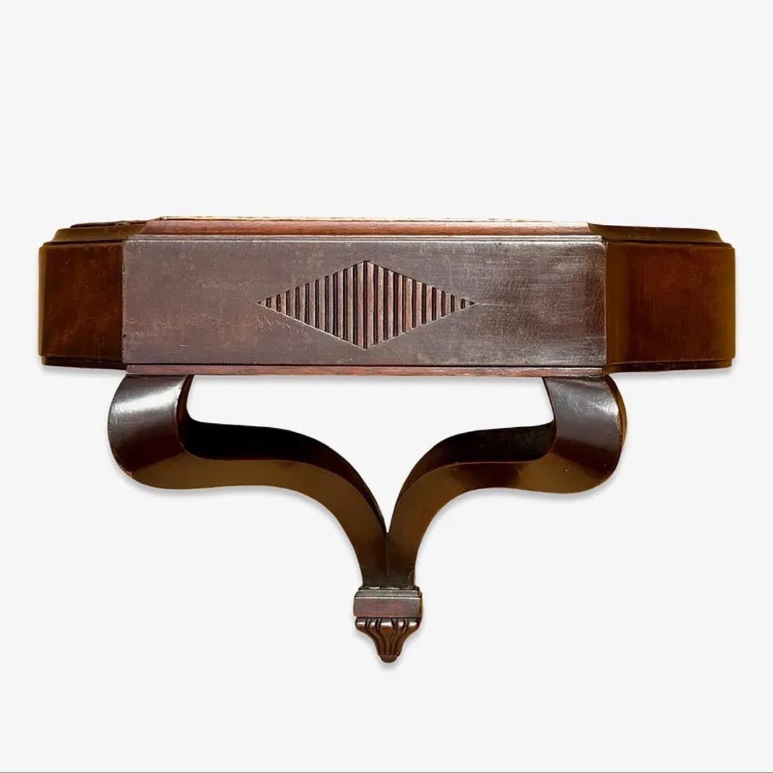 Mahogany Wall Planter Jardiniere Art Deco: Mahogany wood wall-mounted planter or jardiniere with Art Deco or Regency style carved motif and scroll supports. Includes original metal liner. Approx. Dimensions: 13H x 20W x 8D inches