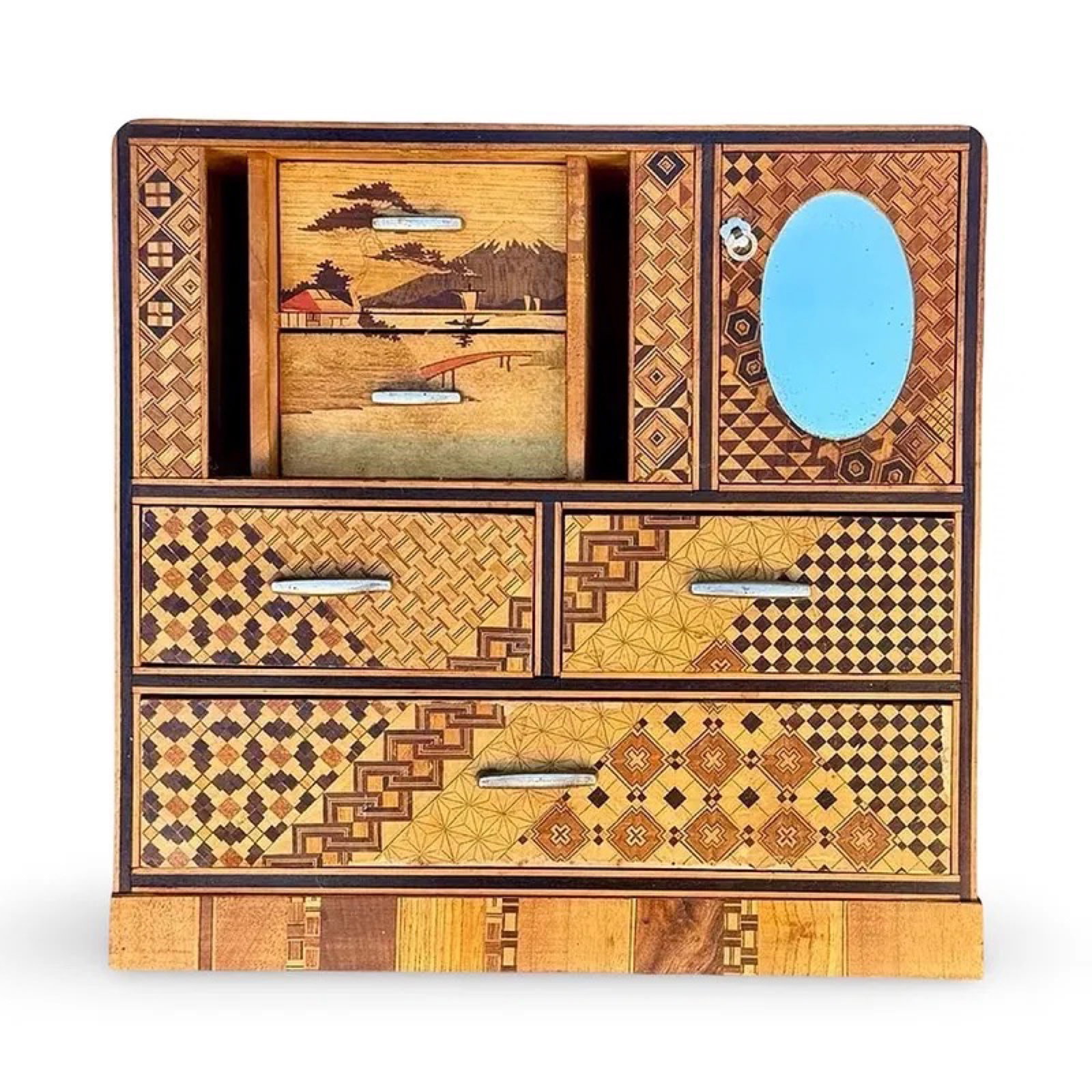Japanese Yosegi Kodansu Cabinet: Japanese Yosegi zaiku kodansu cabinet featuring intricate marquetry and parquetry wood inlay from the Hakone region, likely Meiji era or early 20th century. Miniature storage chest with geometric
