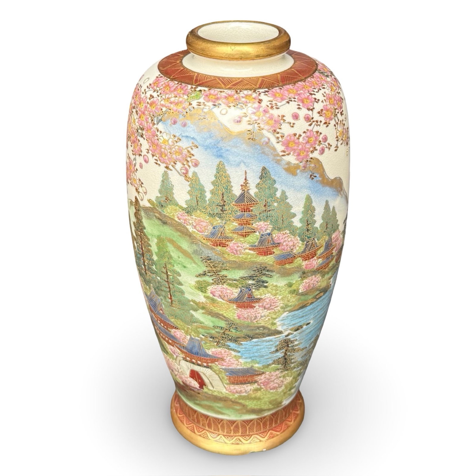 Japanese Satsuma Style Vase: Japanese Satsuma landscape vase with pagoda, cherry blossoms, and gilt detialing. Marked on base. Approx. Dimensions: 10H x 5.5W x 5.5D inches