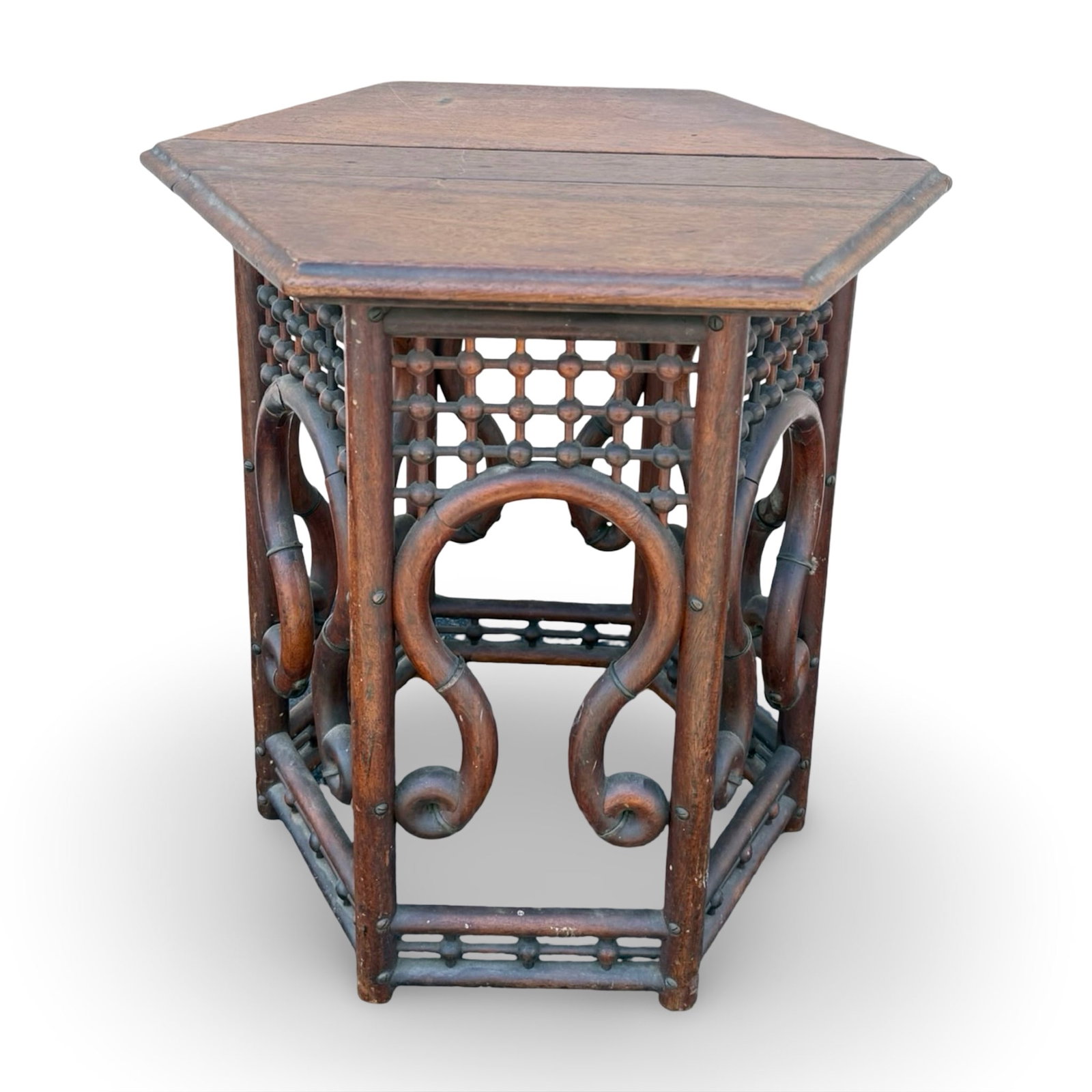 Moorish Hexagon Side Table: Arts & Crafts Moorish Revival hexagonal side table with Mashrabiya-inspired fretwork panels and arched bentwood details, In style of the Liberty & Co. Approx. Dimensions: 18H x 18W x 15.75D inches