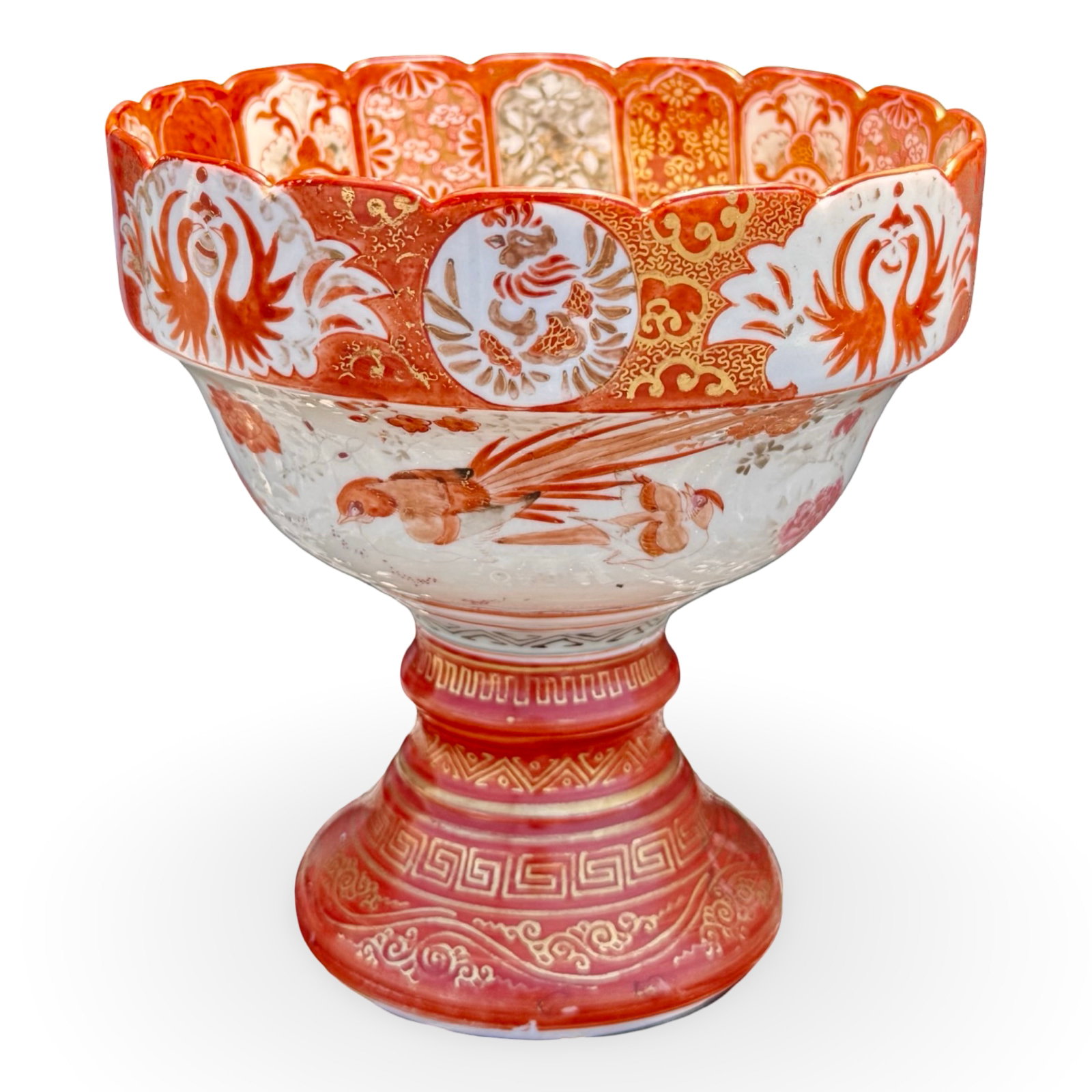 Japanese Kutani Porcelain Bowl Centerpiece: Japanese Kutani porcelain footed bowl centerpiece. Meiji attributed with Aka-e Kinran style decoration including bird or phoenix motifs. Marked on base. Approx. Dimensions: 6.75H x 7W x 7D inches