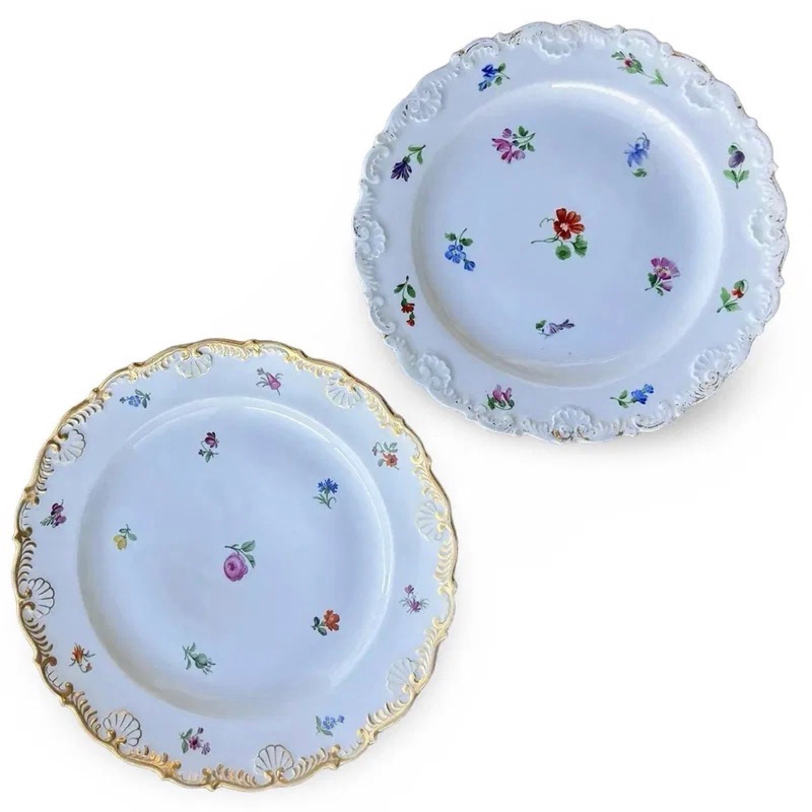 Meissen Streublumen Floral Plates: Meissen porcelain plates in Streublumen Scattered Flowers pattern. Marked on backside. Approx. Dimensions: The larger plate measures 1.25H x 9.5W x 9.5D inches and the smaller plate measures 1H x 8.5W