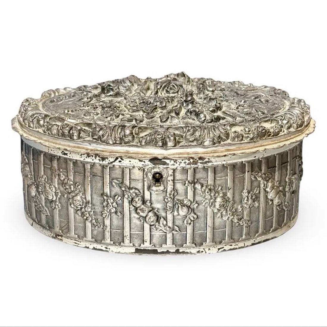 Italian Silverplate Floral Rose Jewelry Box: Vintage Italian silver-plated jewelry box with embossed high-relief floral rose design and yellow textile lining. Marked Made in Italy on base. Approx. Dimensions: 3.5H x 8W x 6D inches