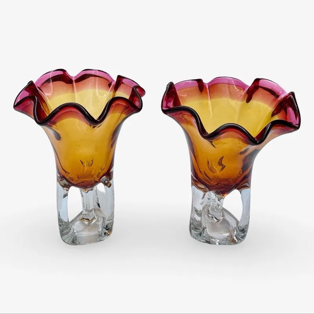 Chribska Bohemian Czech Glass Vases: Chribska Bohemian art glass vases, likely designed by Josef Hospodka, featuring layered ruby and amber tones in a Sommerso style. Approx. Dimension: 10H x 9W x 9D inches