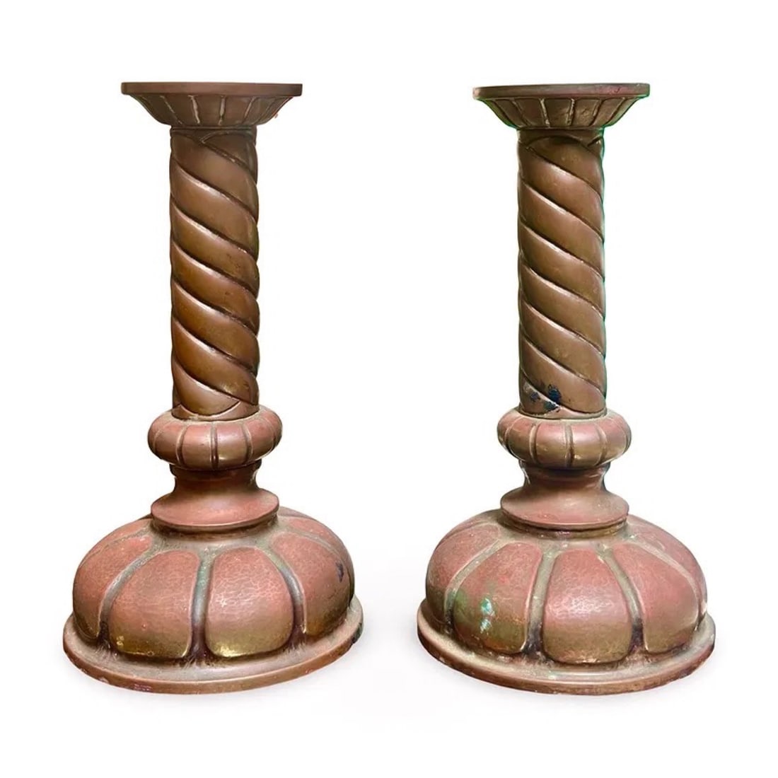 Copper Twisted Arts & Crafts Candlesticks: Arts & Crafts hammered copper candlesticks pair with barley twist spiral columns and weighted fluted petal bases. Approx. Dimensions: H x W x D inches